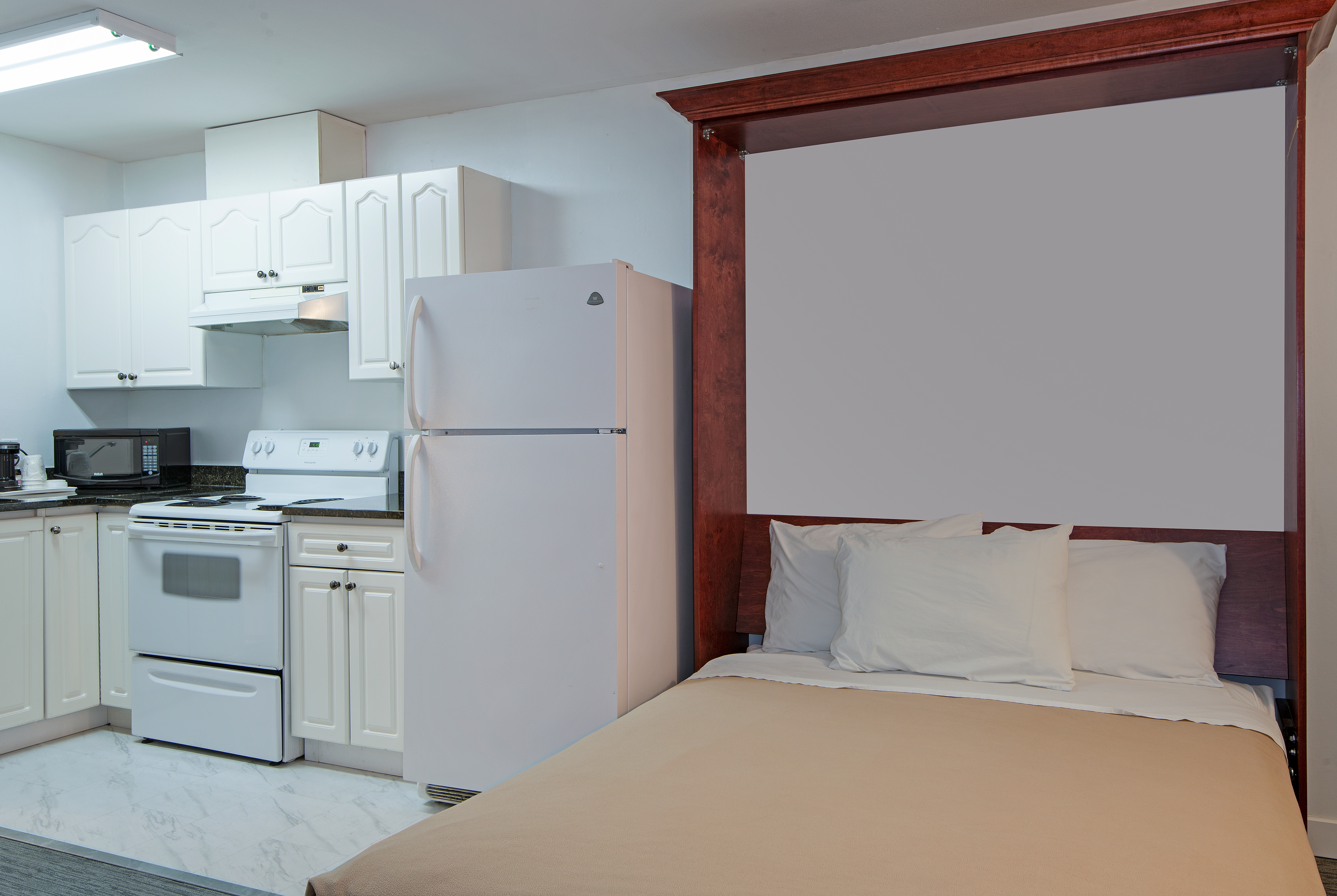 Guest room at the Travelodge by Wyndham Kamloops Mountview in Kamloops, British Columbia