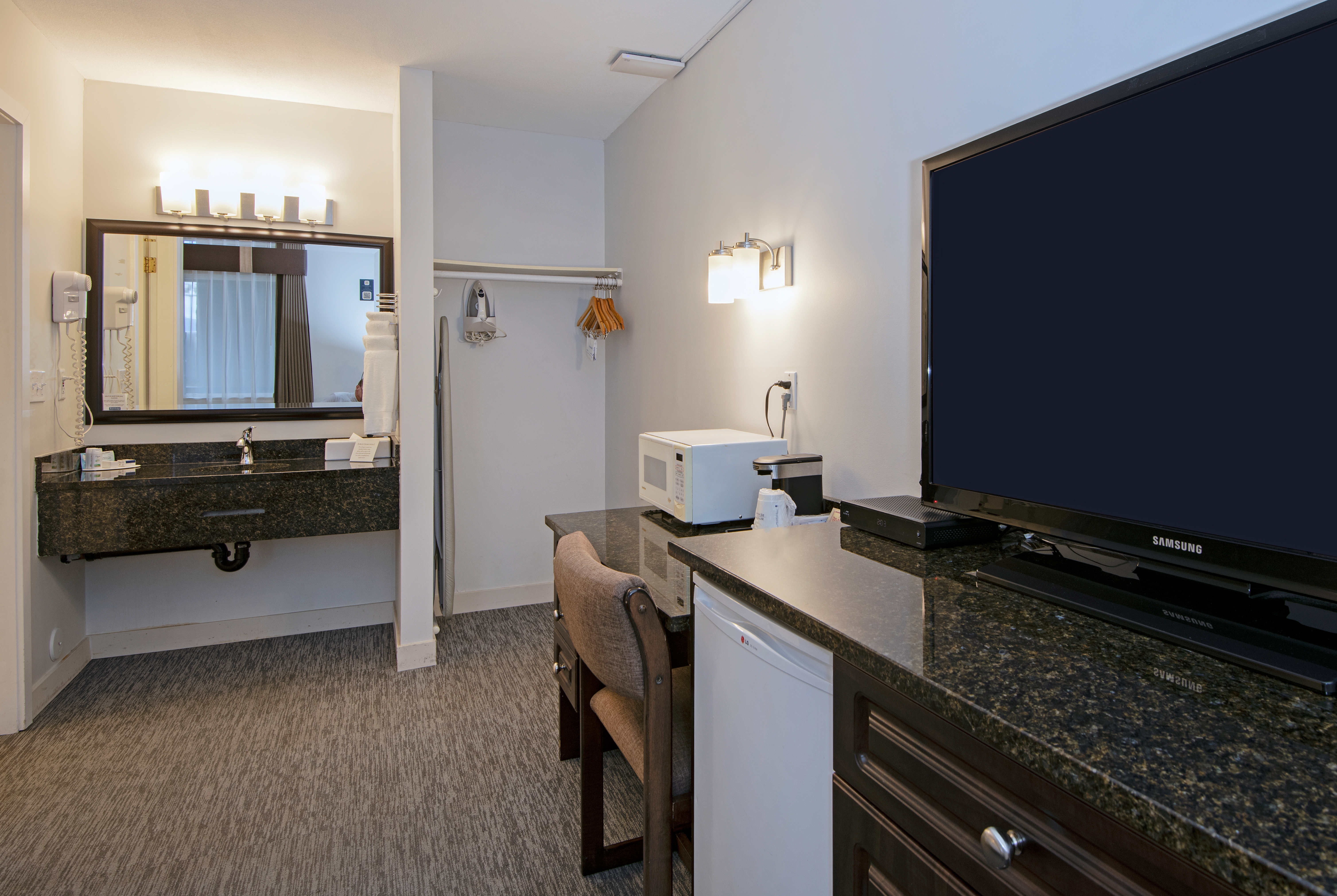 Guest room at the Travelodge by Wyndham Kamloops Mountview in Kamloops, British Columbia