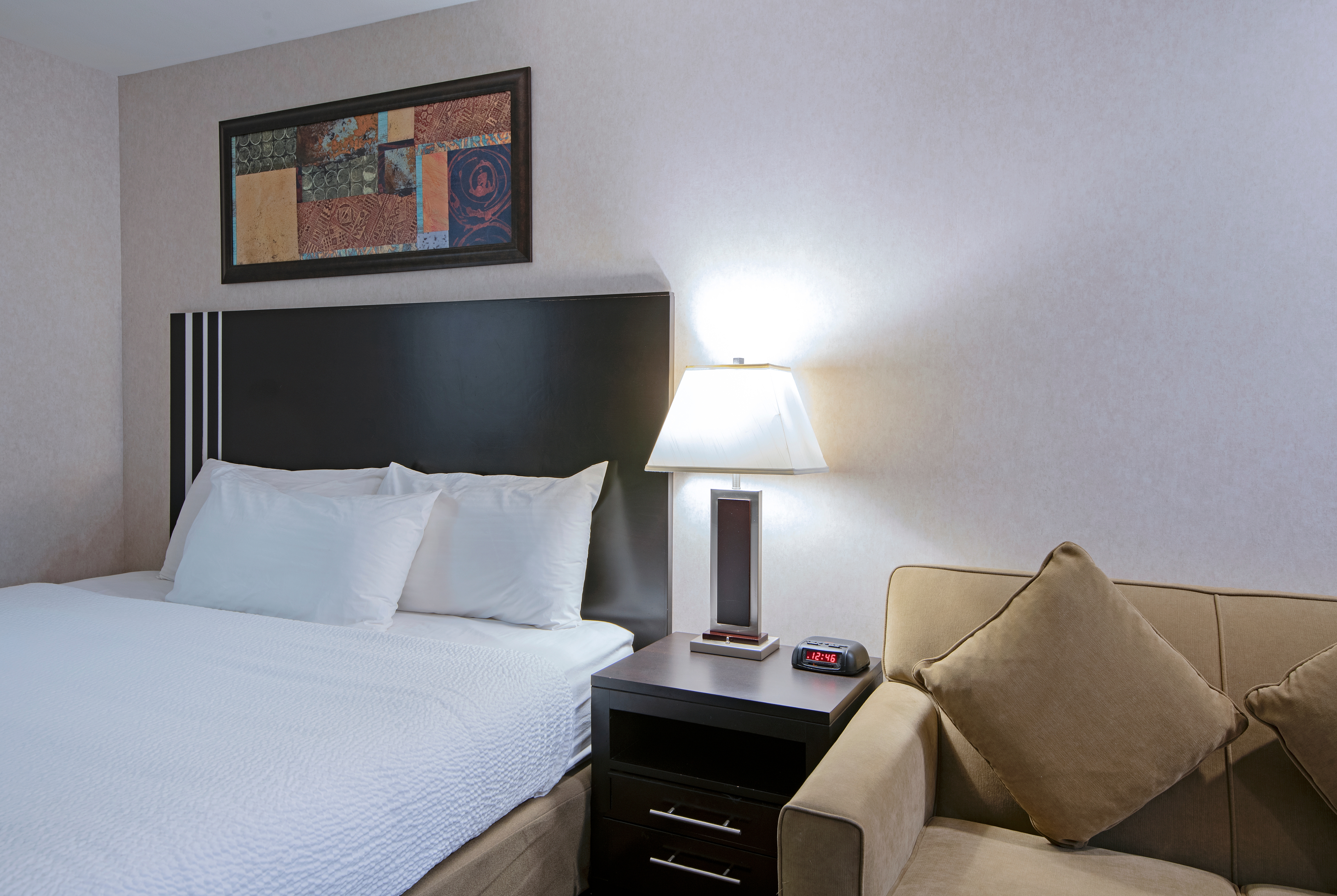 Guest room at the Travelodge by Wyndham Kamloops Mountview in Kamloops, British Columbia