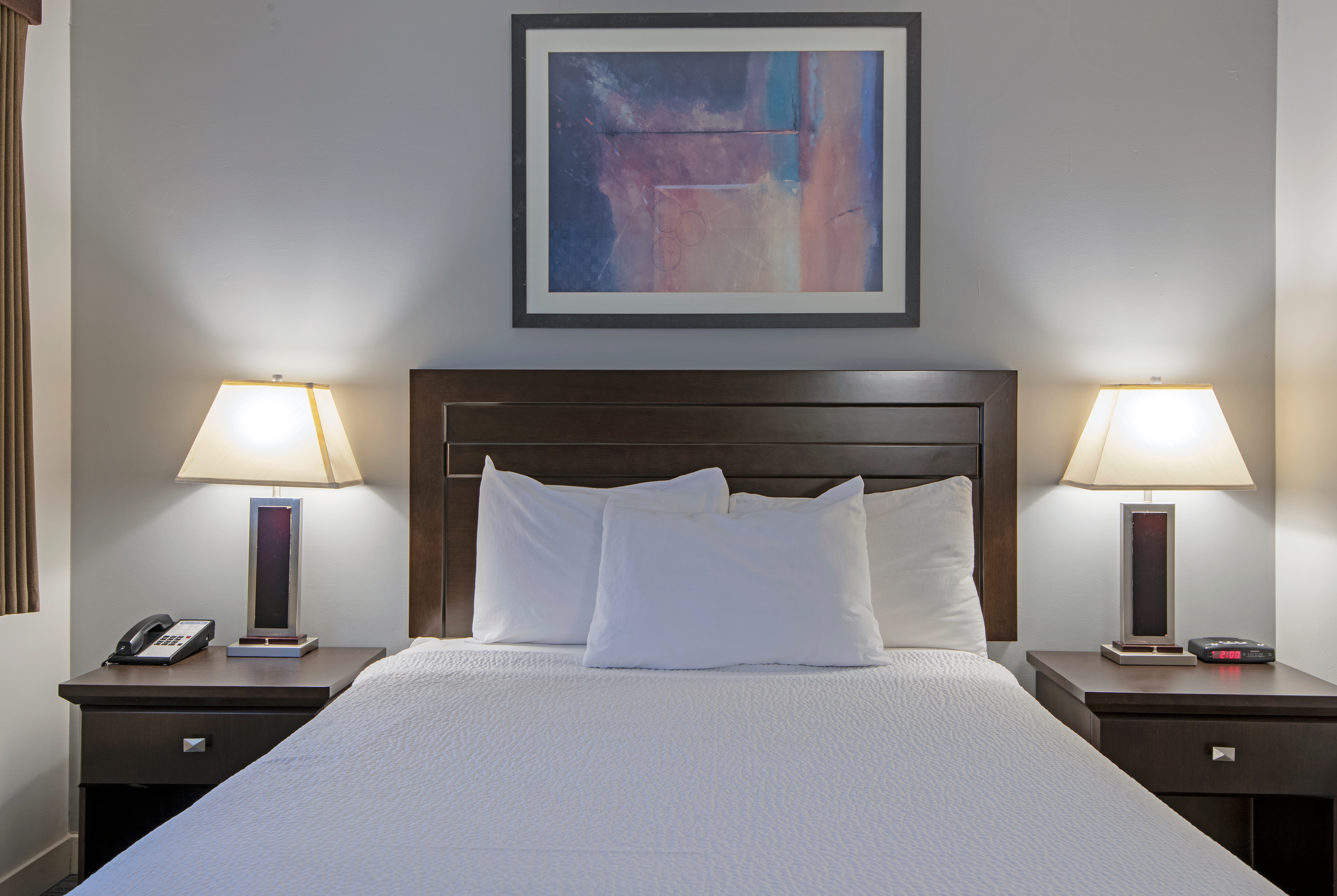 Guest room at the Travelodge by Wyndham Kamloops Mountview in Kamloops, British Columbia