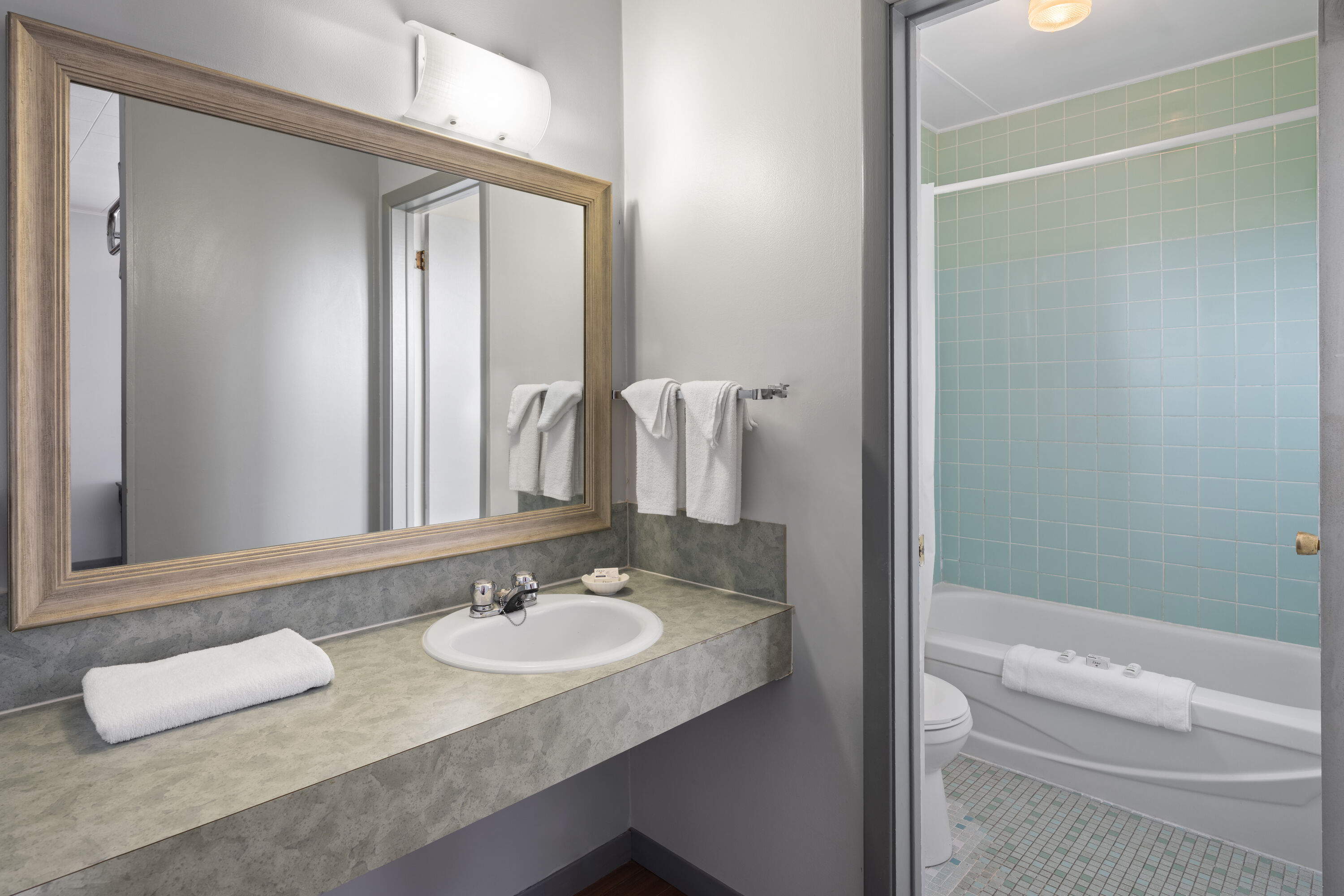 Guest room bath at the Travelodge by Wyndham Grand Falls in Saint Andre, New Brunswick