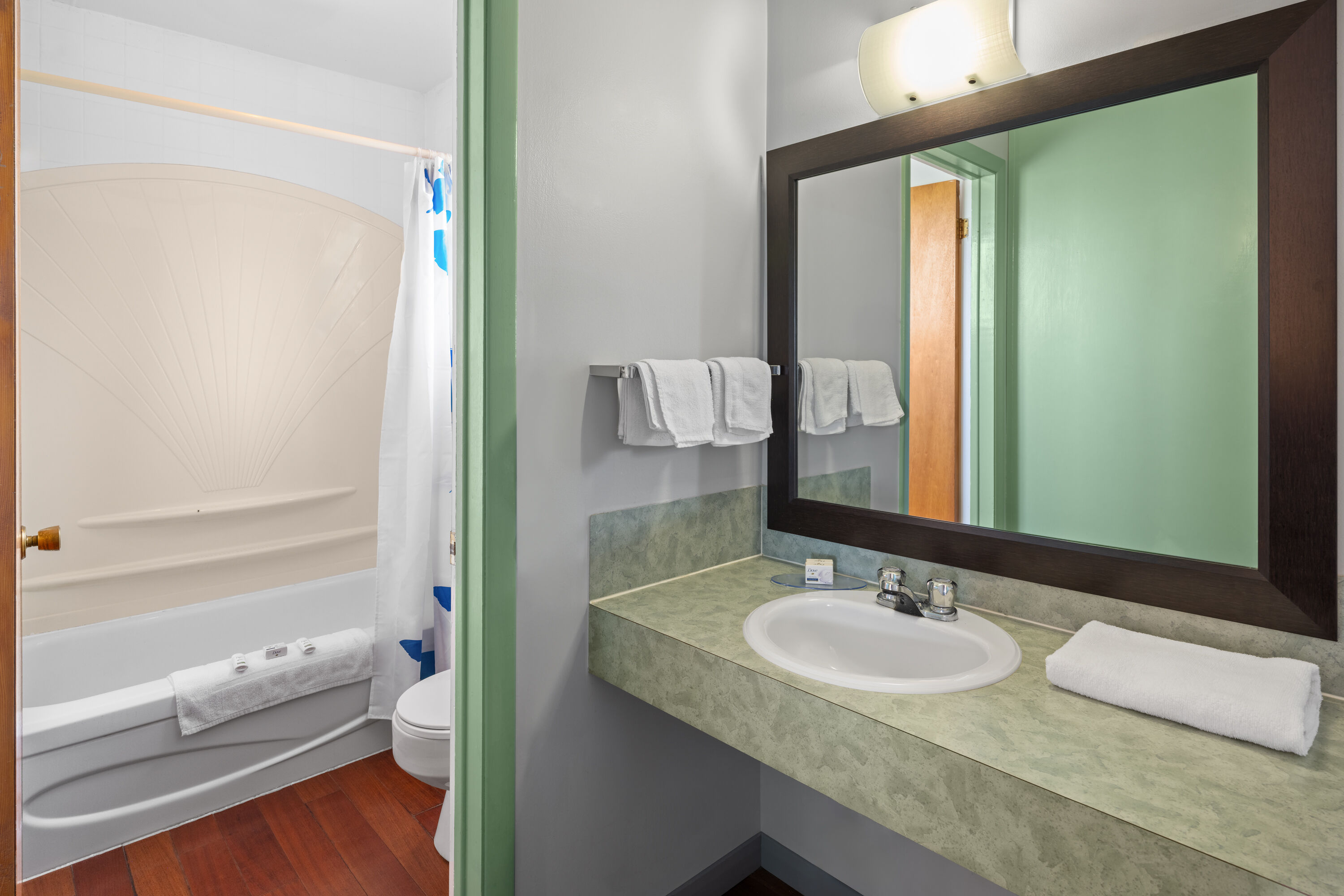 Guest room bath at the Travelodge by Wyndham Grand Falls in Saint Andre, New Brunswick