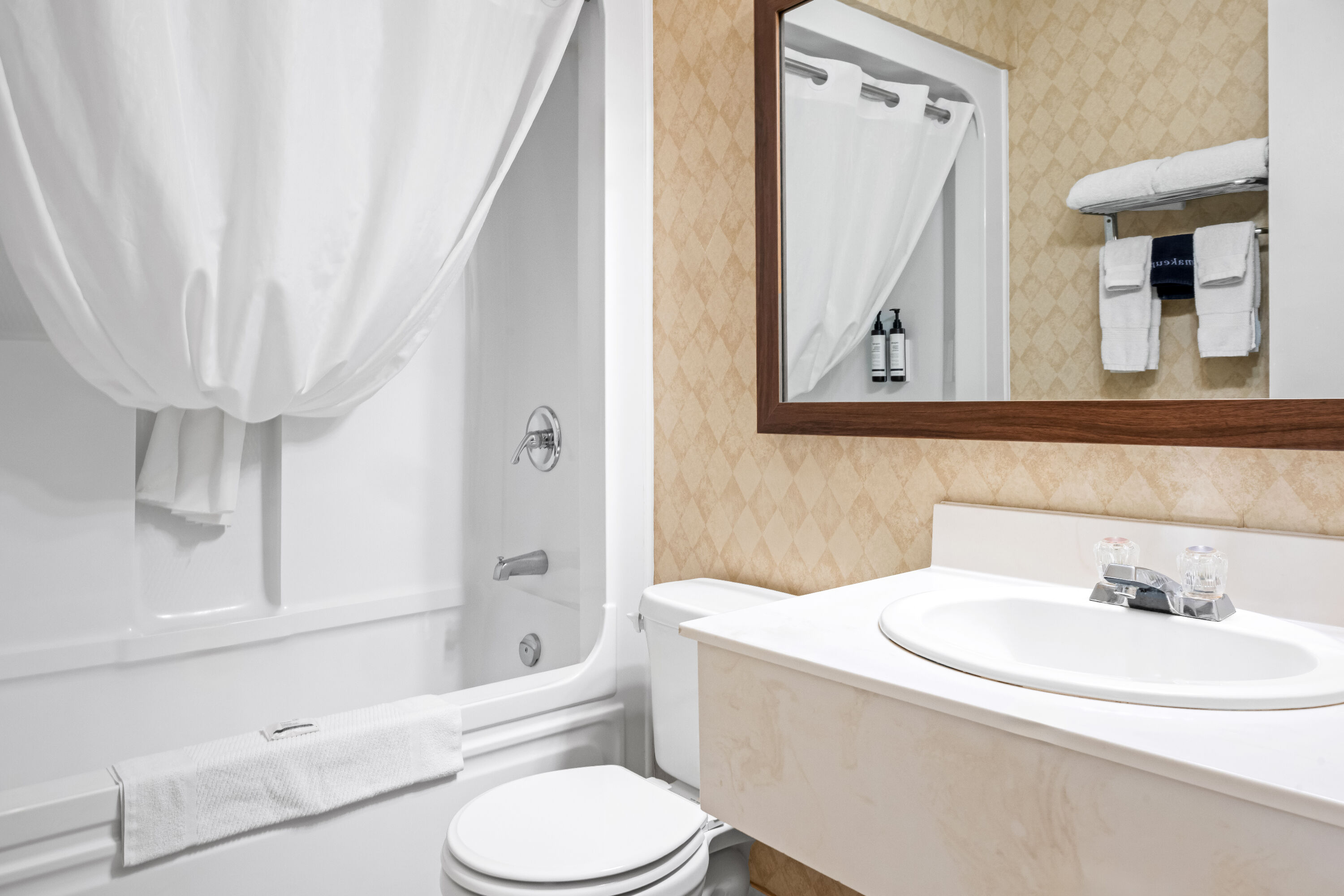 Guest room bath at the Travelodge by Wyndham Amherst in Amherst, Nova Scotia