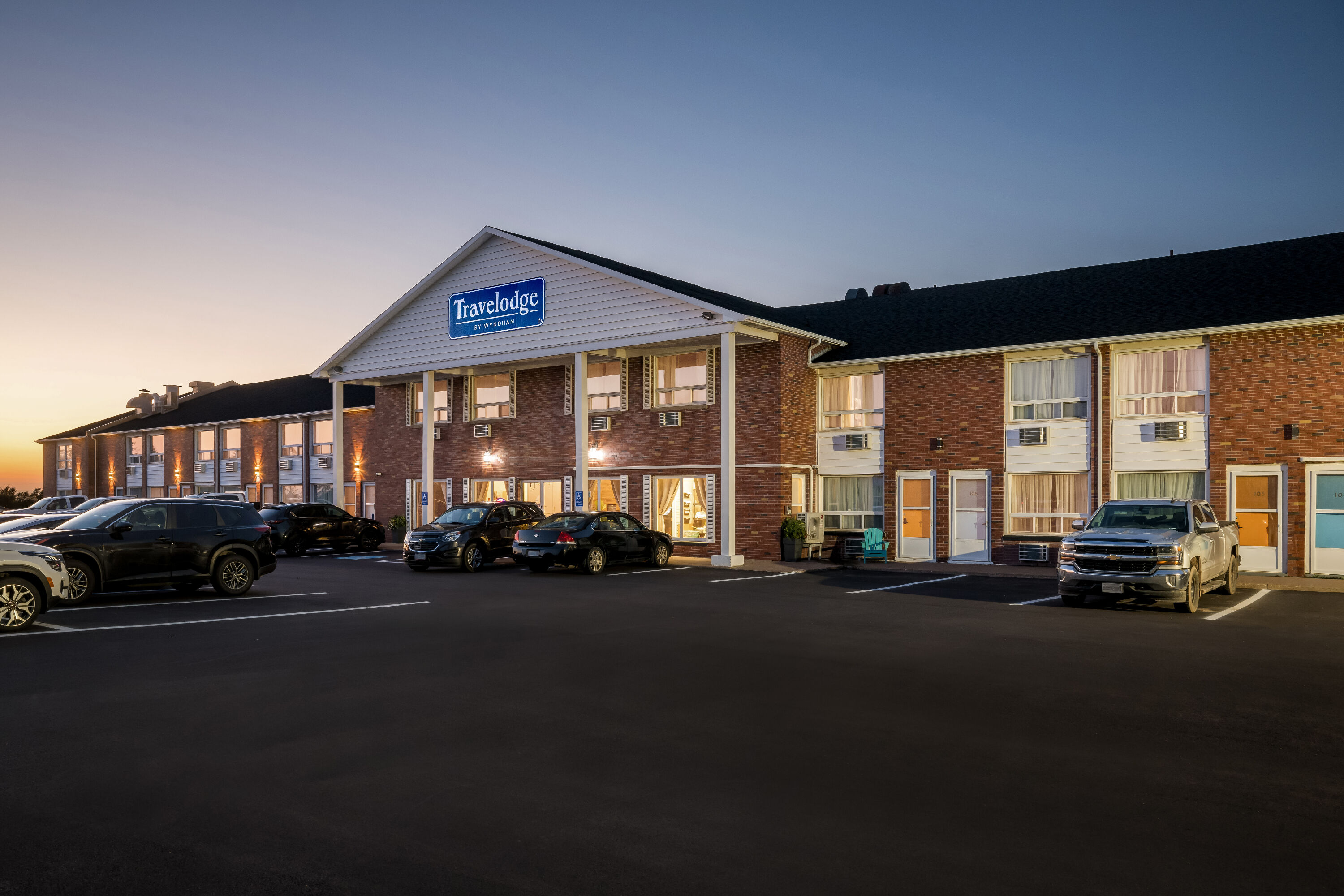 Exterior Night Image of Travelodge by Wyndham Amherst hotel in Amherst, Nova Scotia