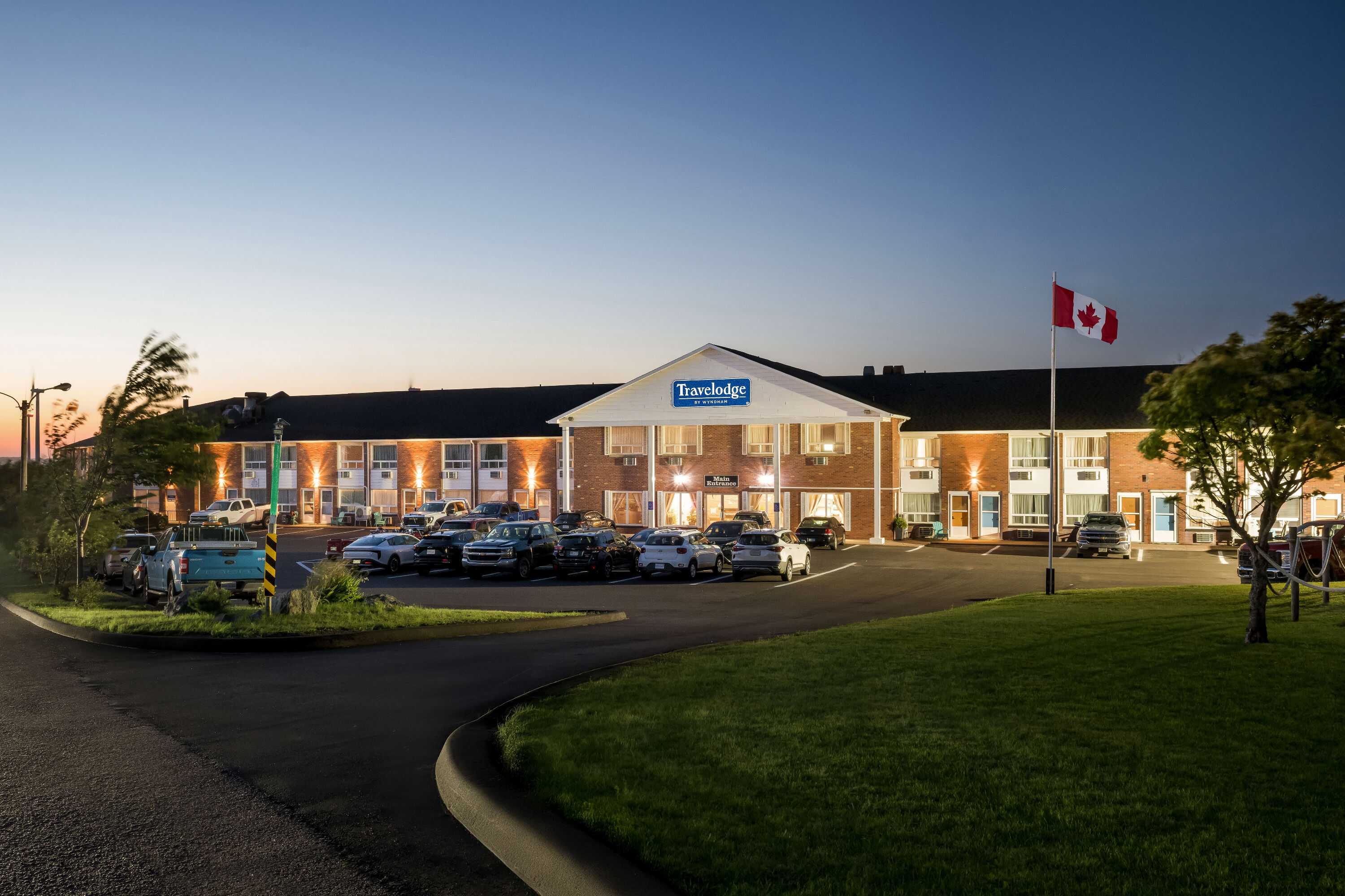 Exterior Night Image of Travelodge by Wyndham Amherst hotel in Amherst, Nova Scotia