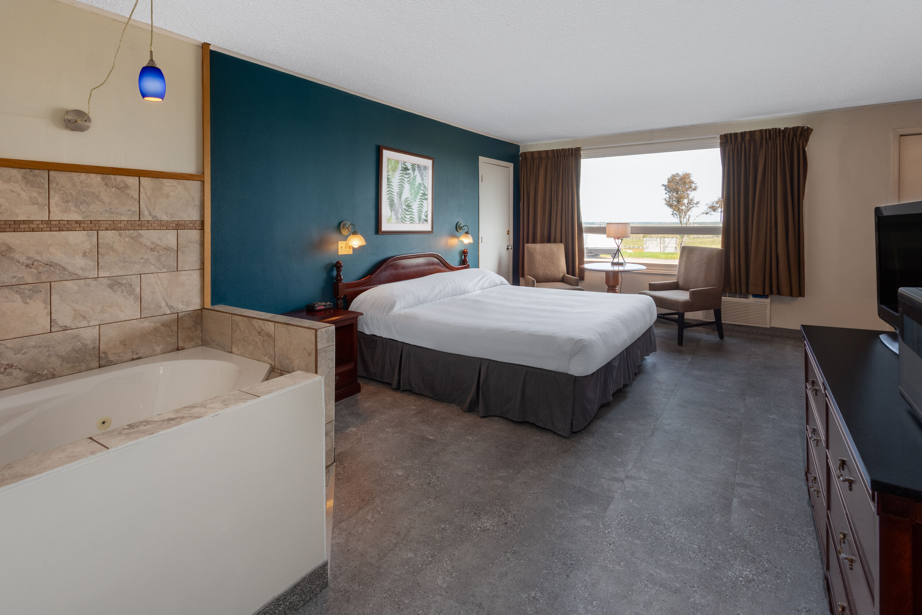 Guest room at the Travelodge by Wyndham Amherst in Amherst, Nova Scotia