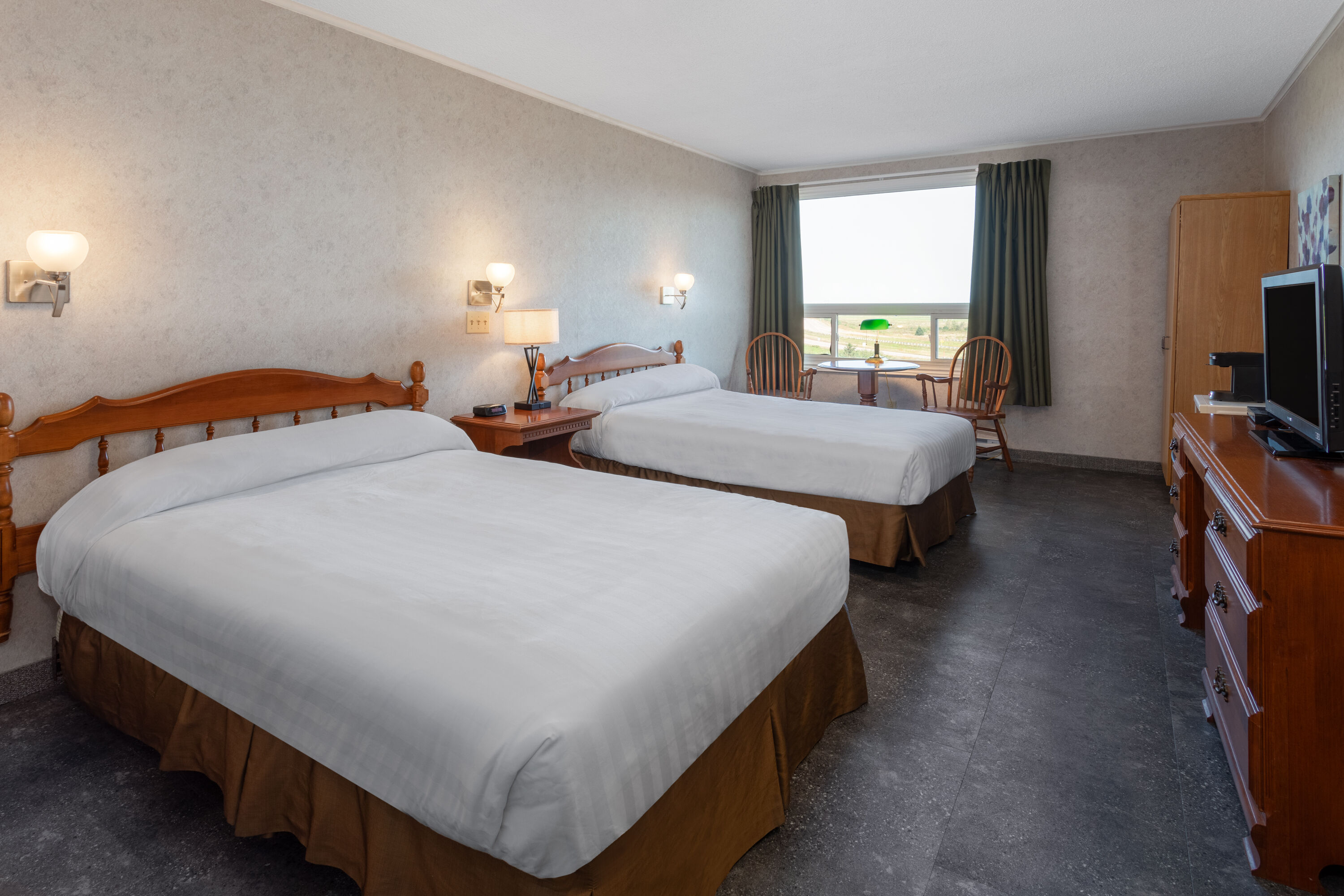 Guest room at the Travelodge by Wyndham Amherst in Amherst, Nova Scotia