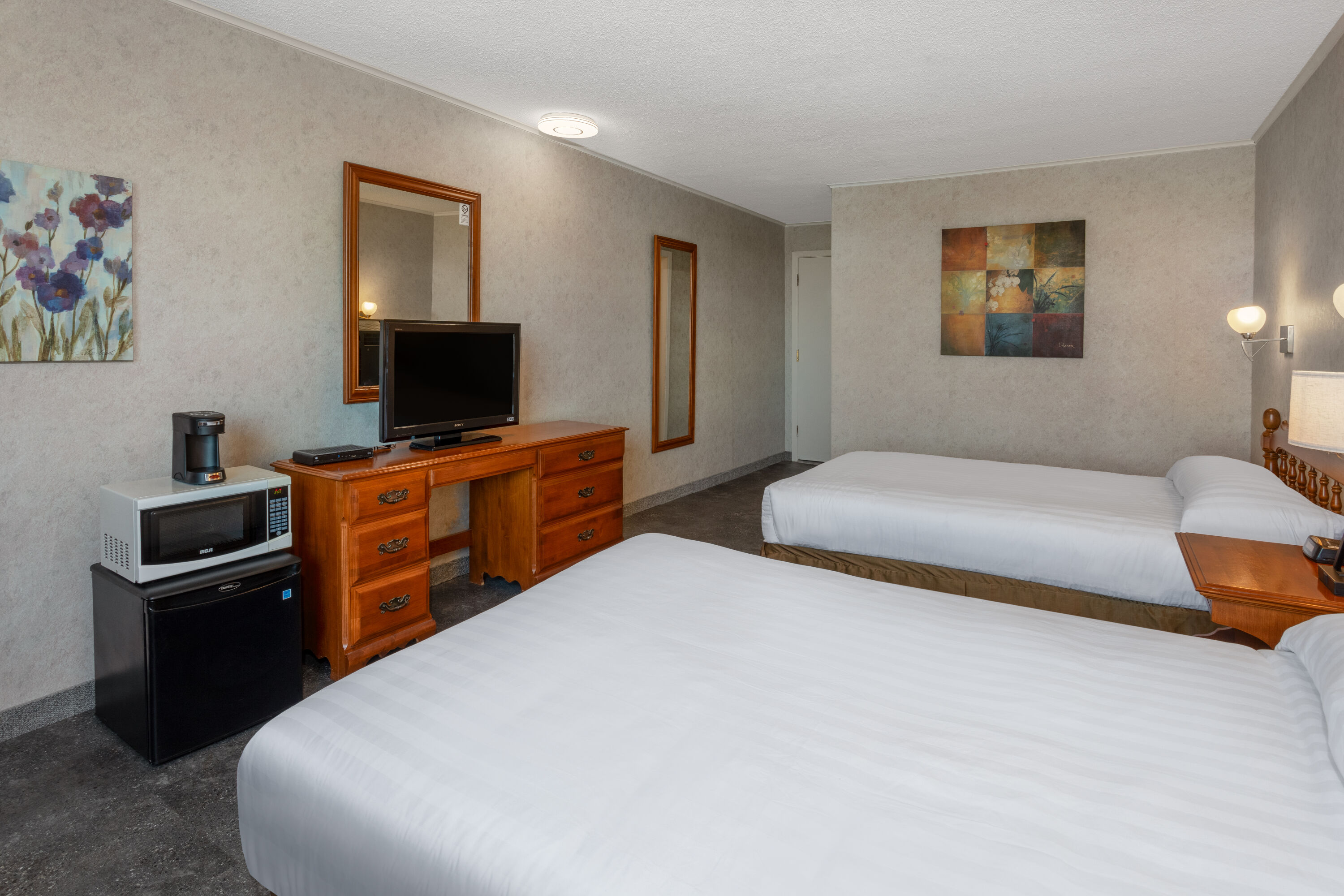 Guest room at the Travelodge by Wyndham Amherst in Amherst, Nova Scotia