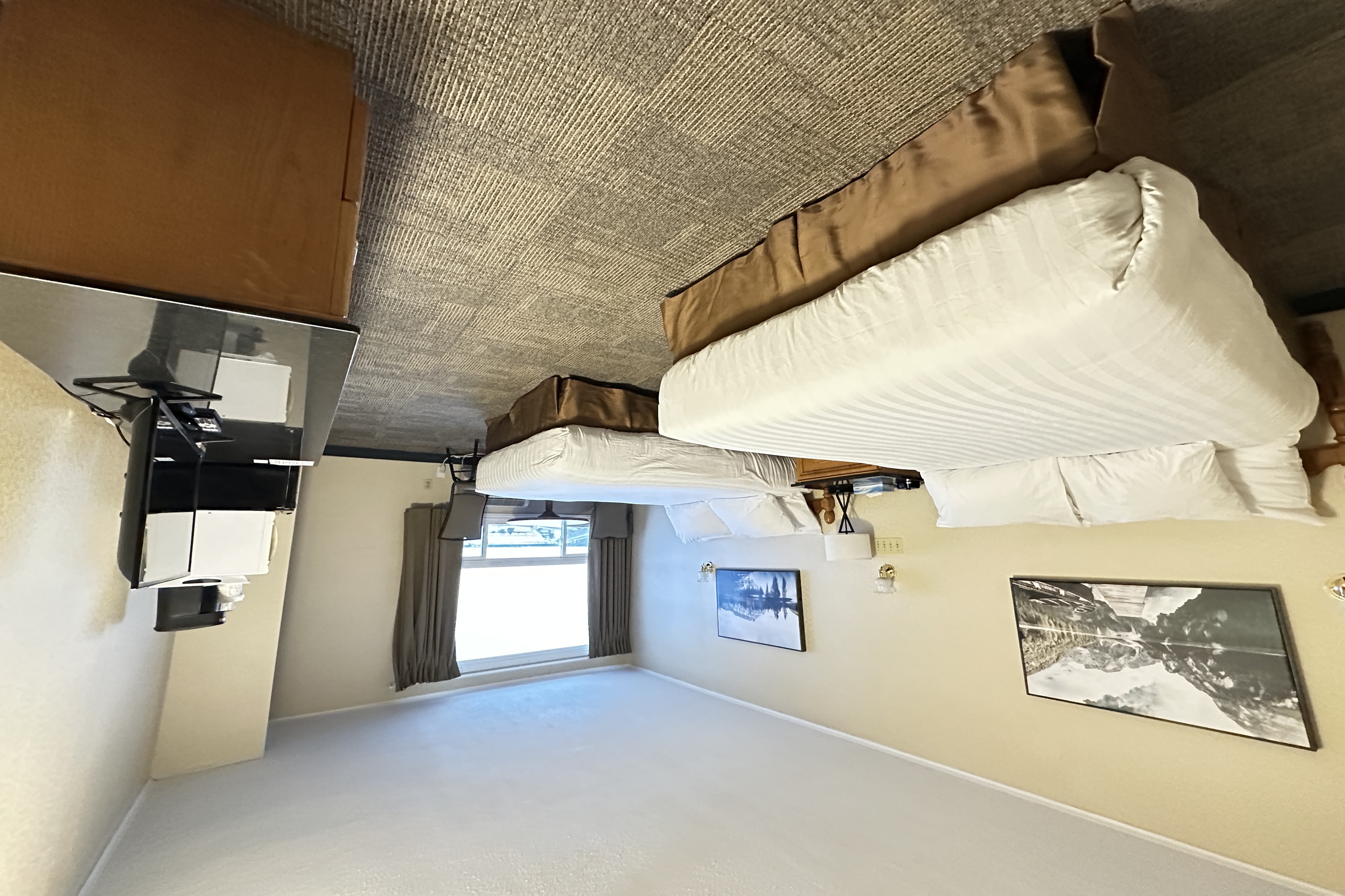 Guest room at the Travelodge by Wyndham Amherst in Amherst, Nova Scotia