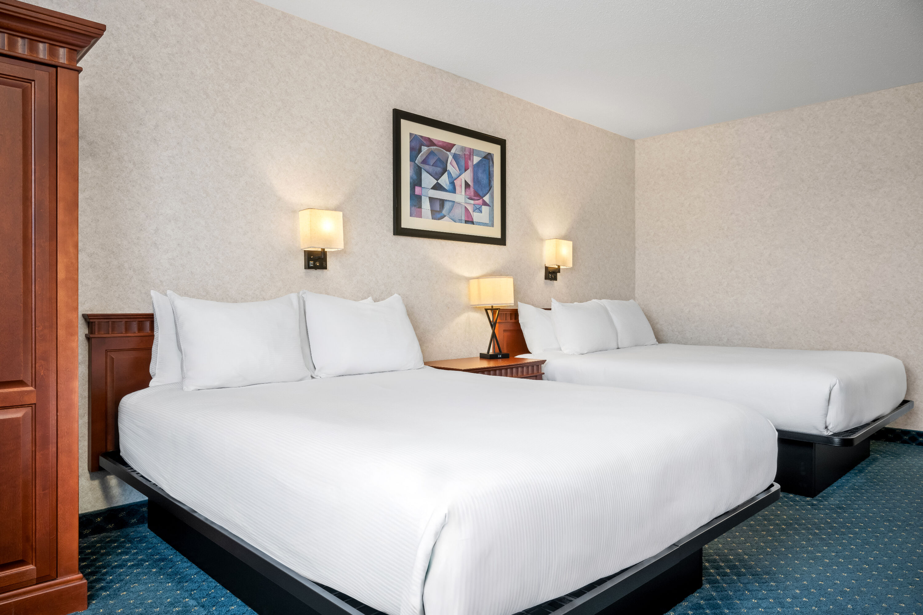 Double bed guest room at the Travelodge by Wyndham Amherst in Amherst, Nova Scotia