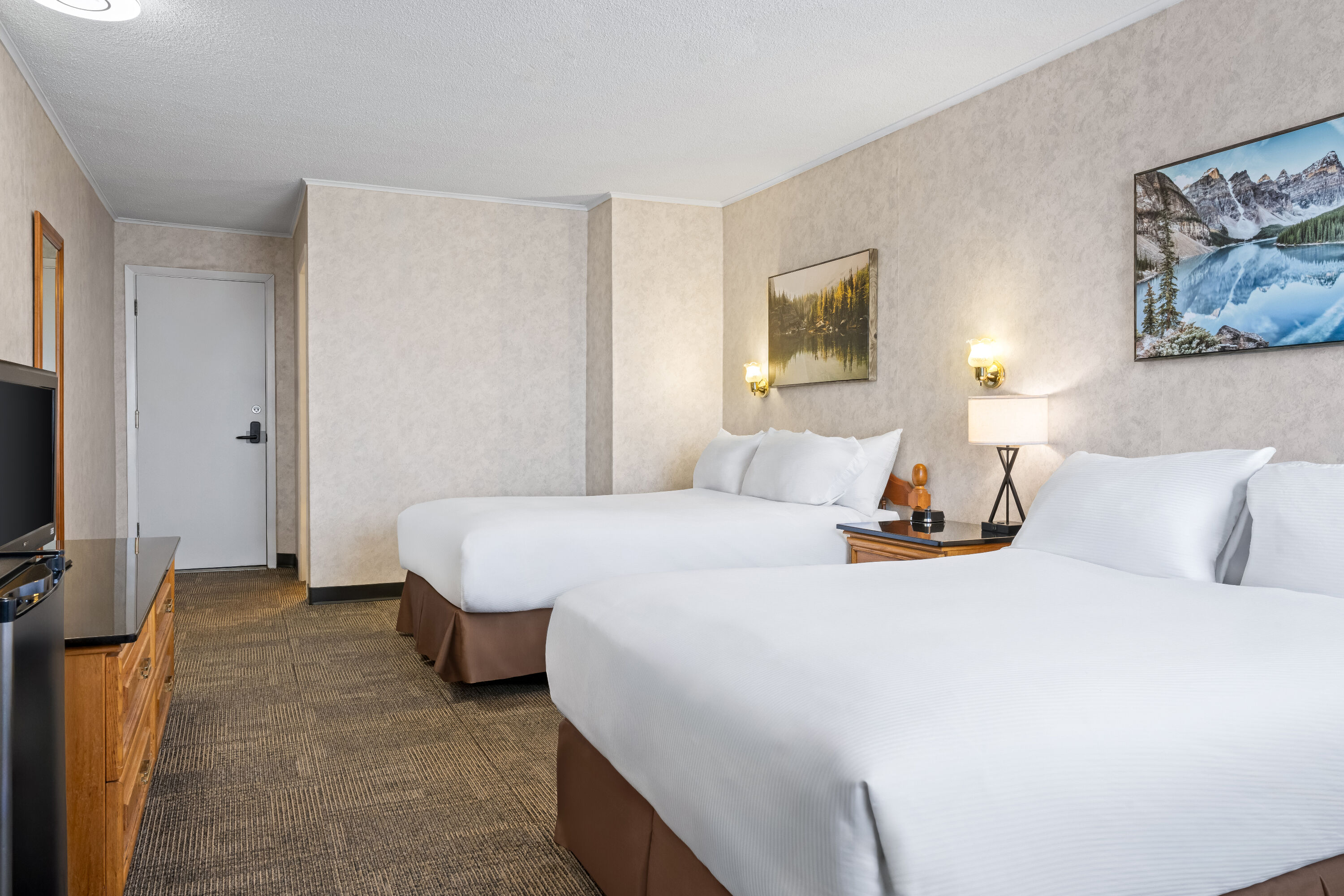 Double bed guest room at the Travelodge by Wyndham Amherst in Amherst, Nova Scotia