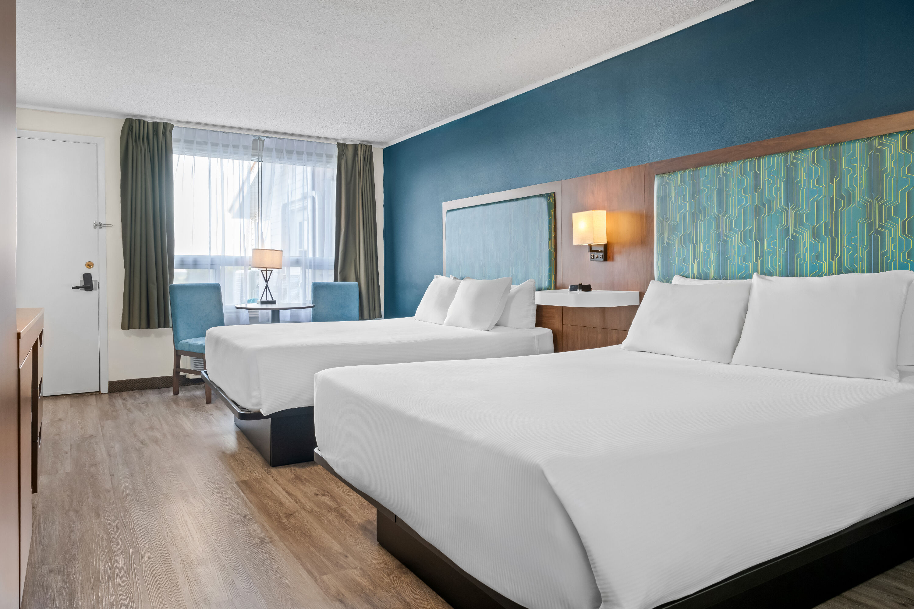 Double bed guest room at the Travelodge by Wyndham Amherst in Amherst, Nova Scotia