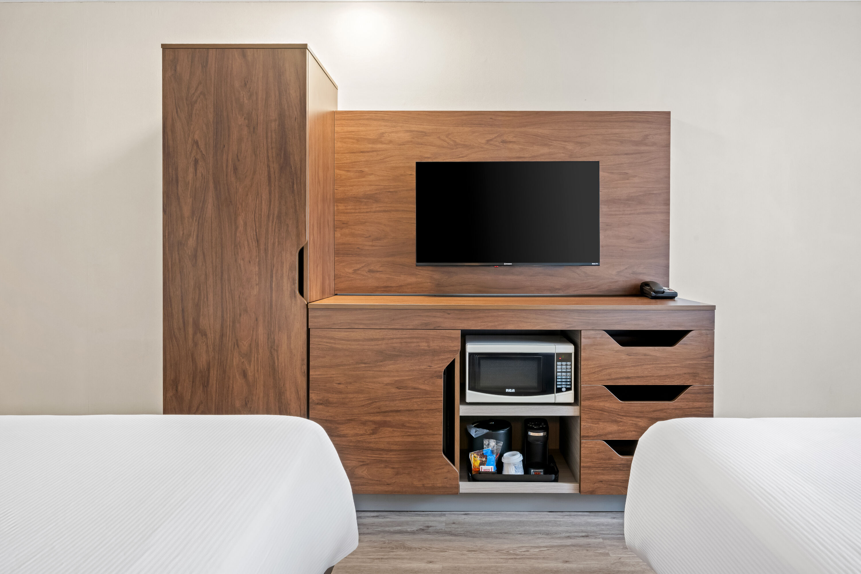Double bed guest room at the Travelodge by Wyndham Amherst in Amherst, Nova Scotia