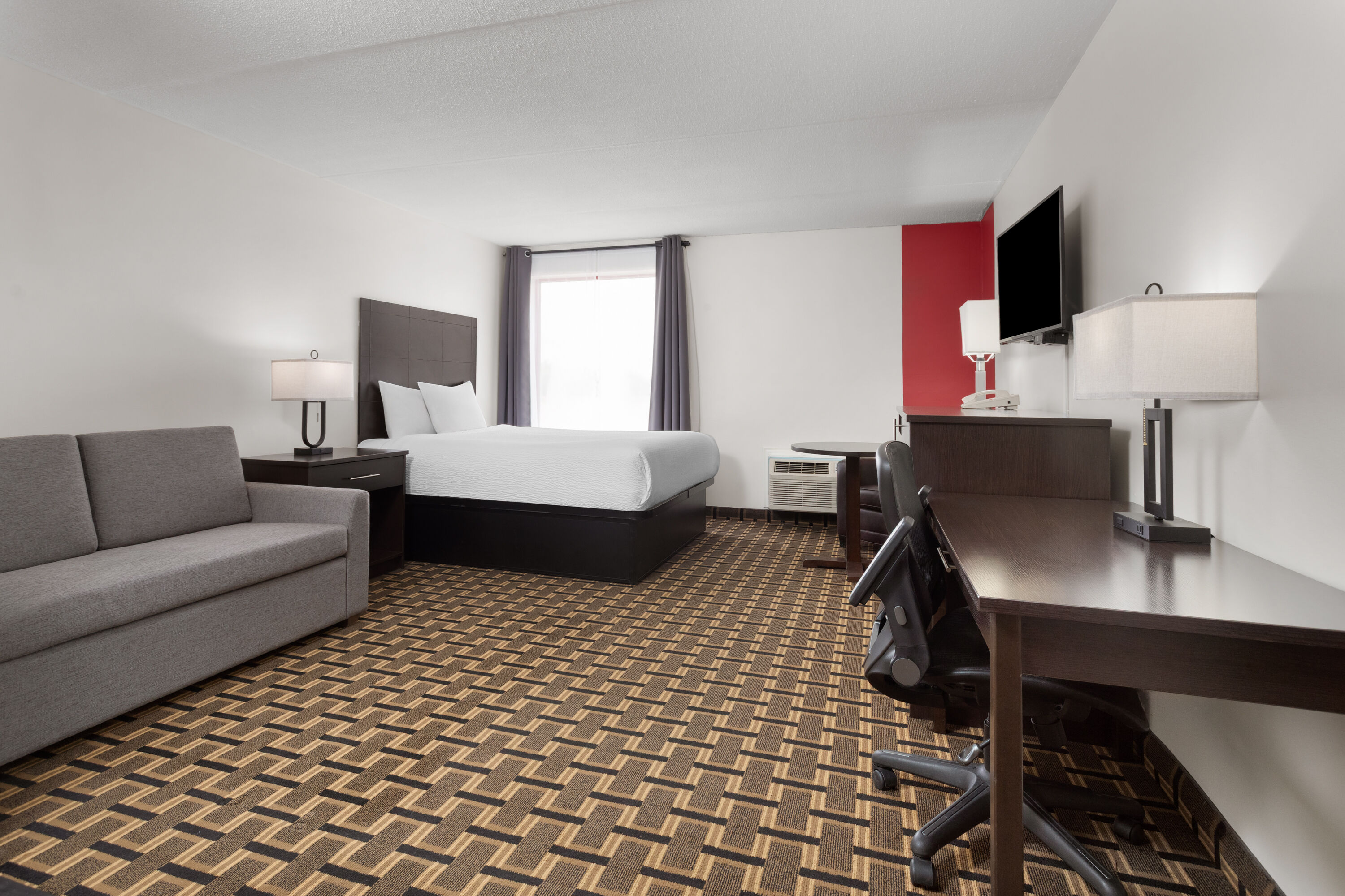 Guest room at the Travelodge by Wyndham Lindsay in Lindsay, Ontario