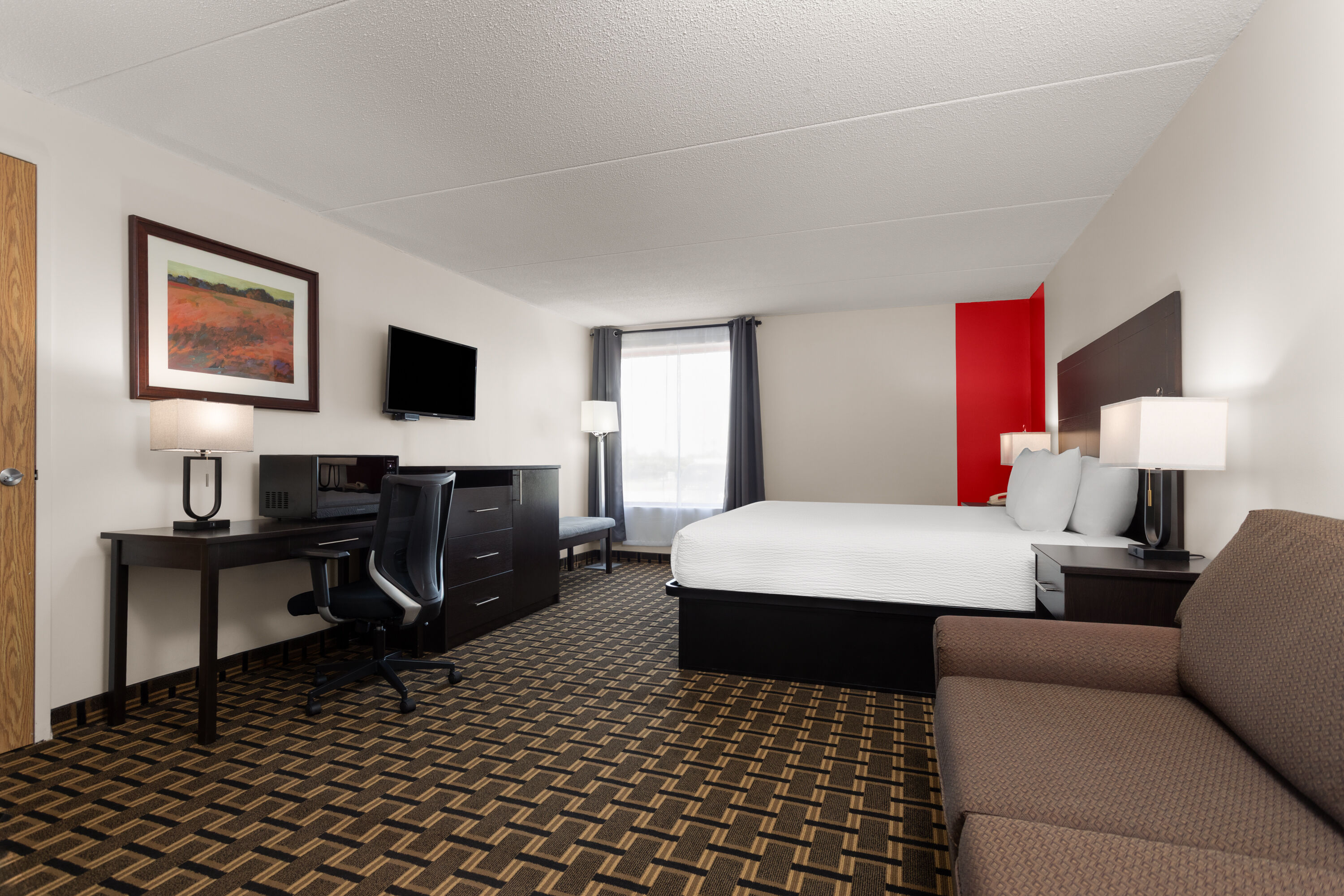 Guest room at the Travelodge by Wyndham Lindsay in Lindsay, Ontario