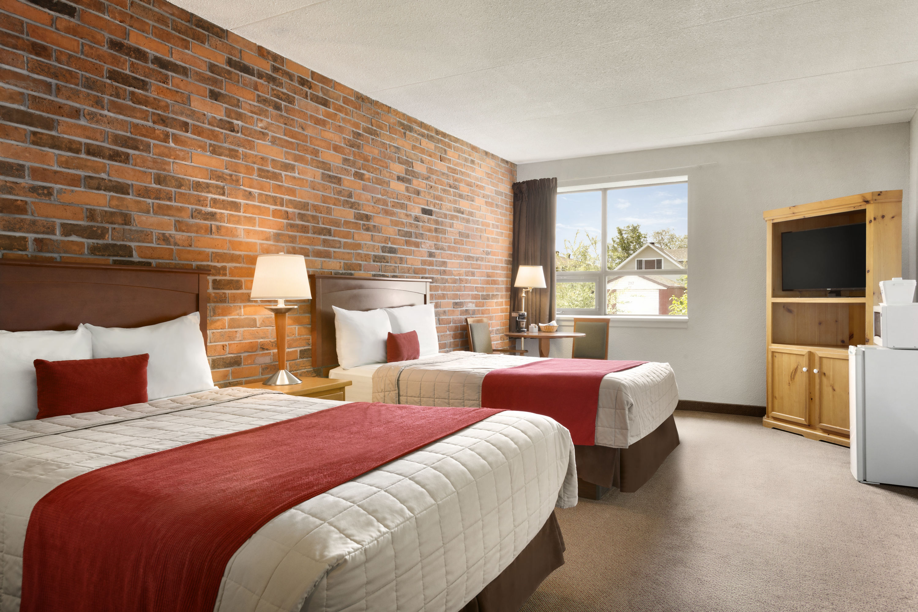 Guest room at the Travelodge by Wyndham North Bay in North Bay, Ontario