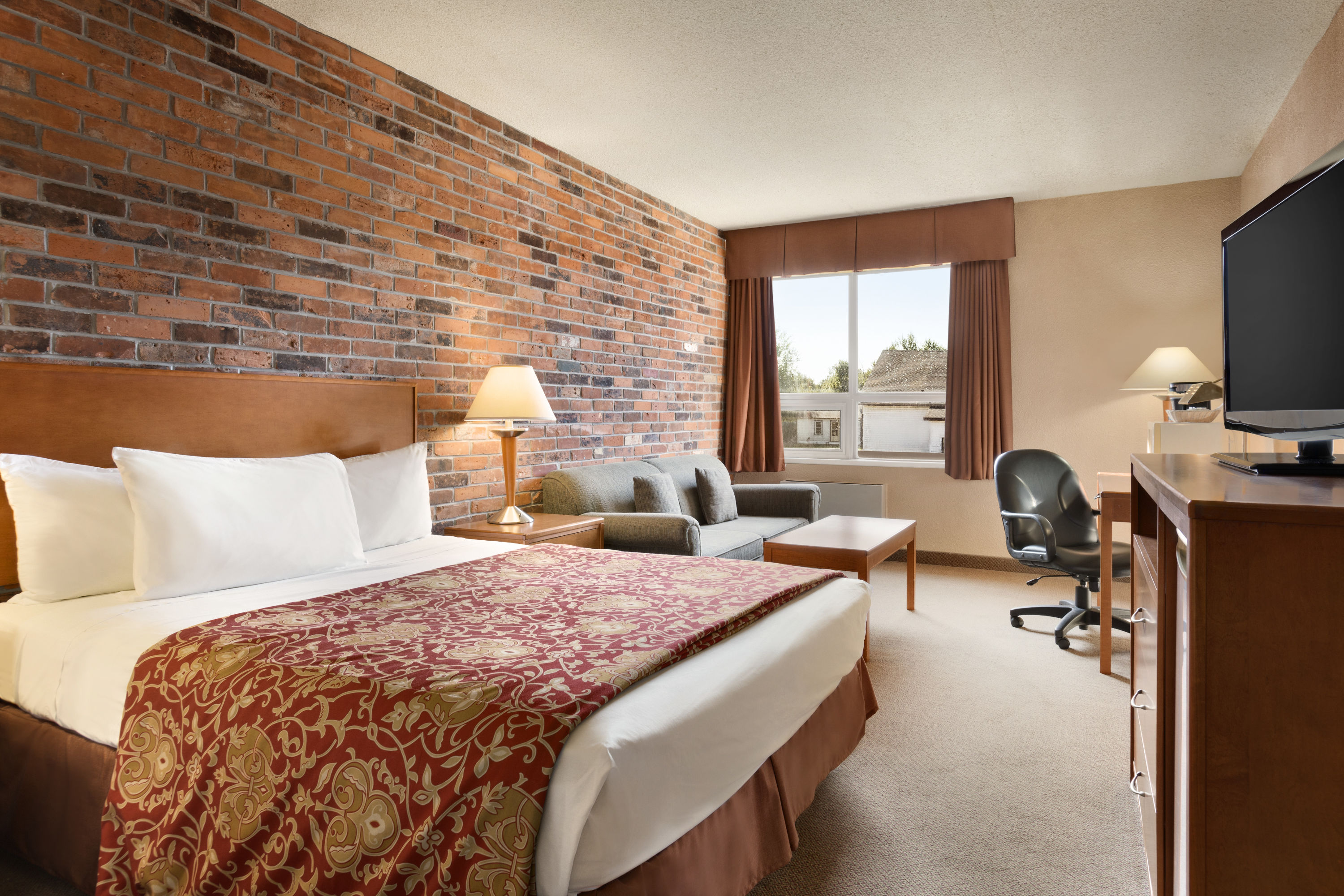 Guest room at the Travelodge by Wyndham North Bay in North Bay, Ontario