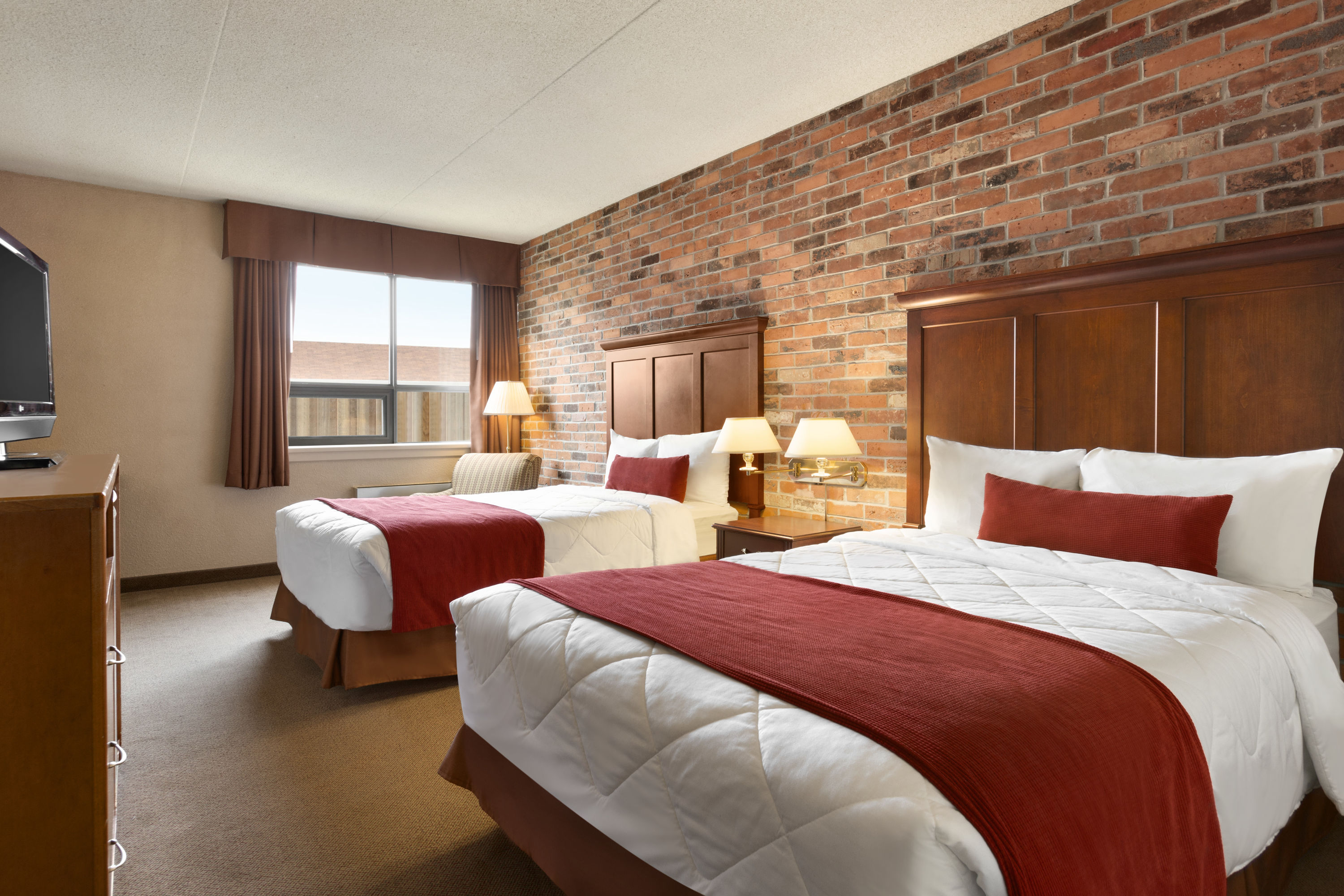 Guest room at the Travelodge by Wyndham North Bay in North Bay, Ontario