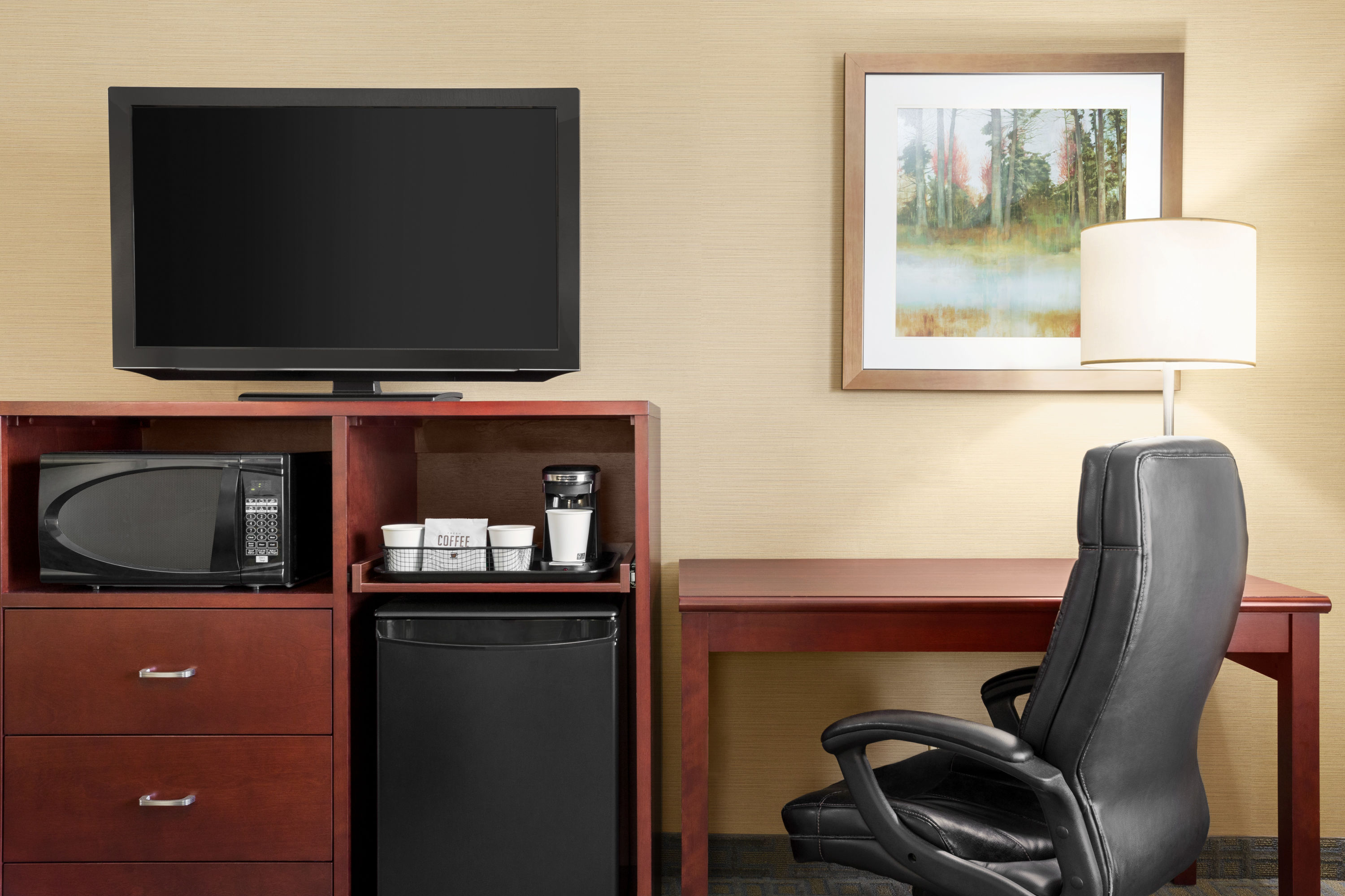 Guest room at the Travelodge by Wyndham Oshawa Whitby in Oshawa, Ontario