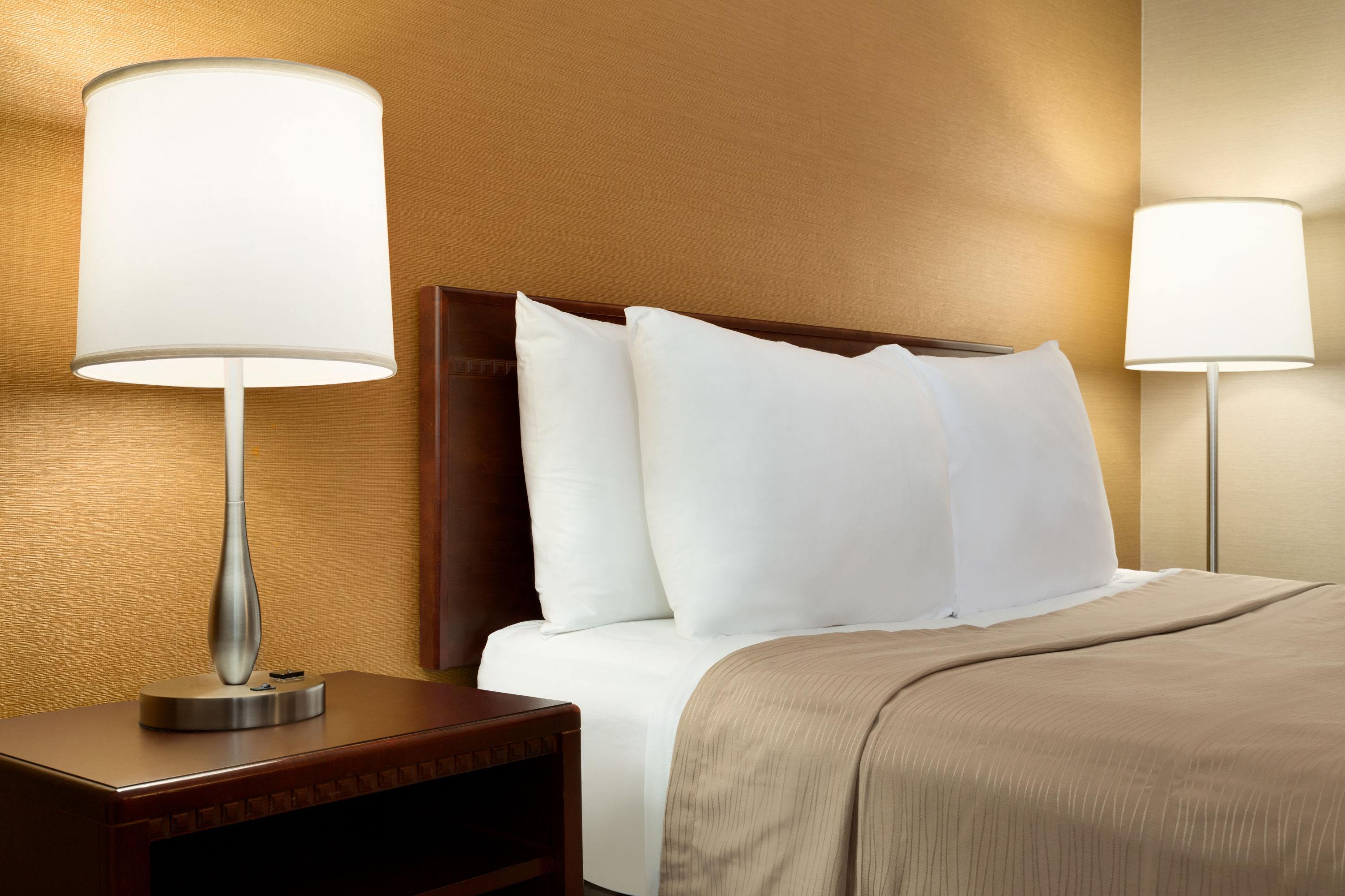 Guest room at the Travelodge by Wyndham Toronto East in Toronto, Ontario