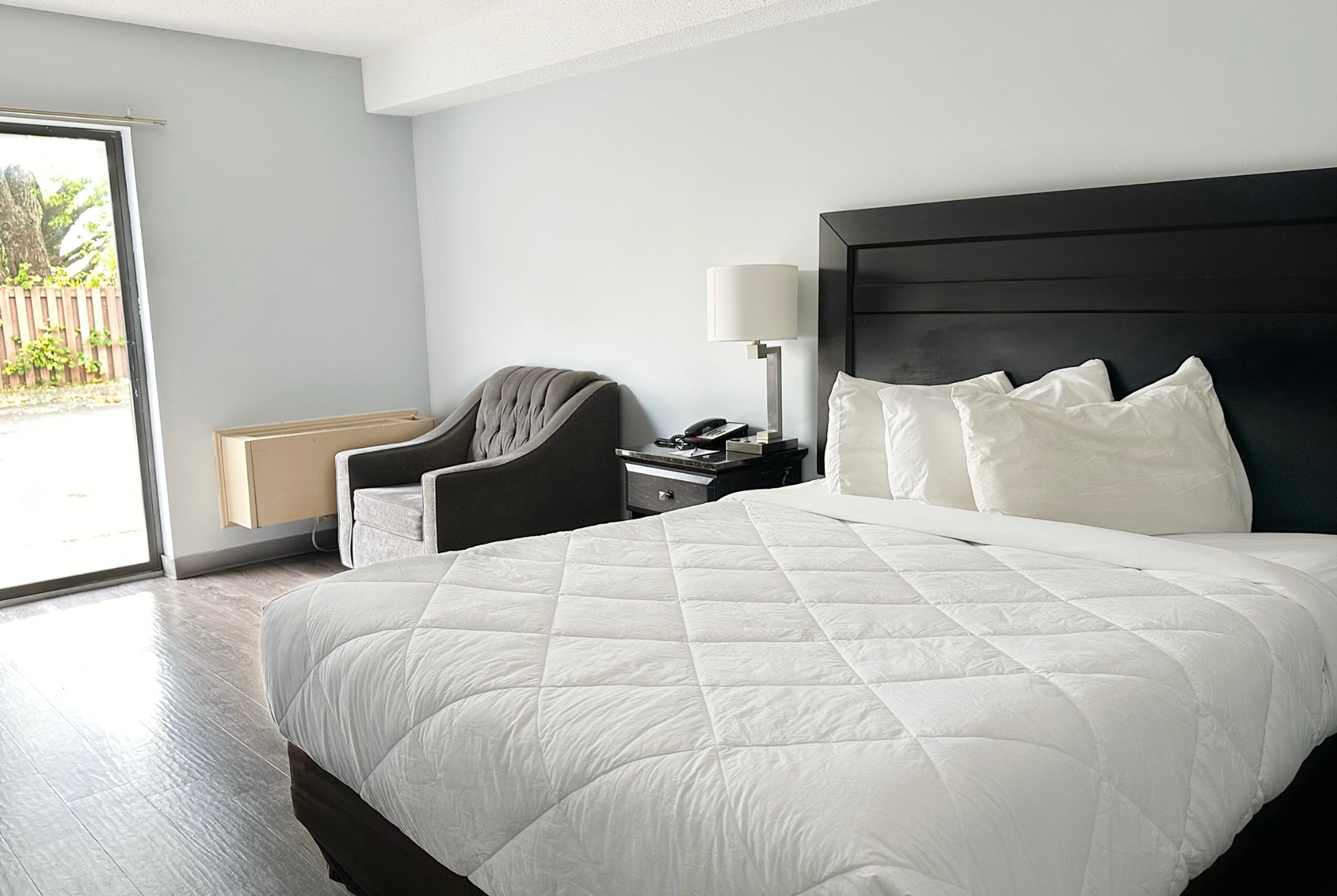 Guest room at the Travelodge by Wyndham Welland in Welland, Ontario