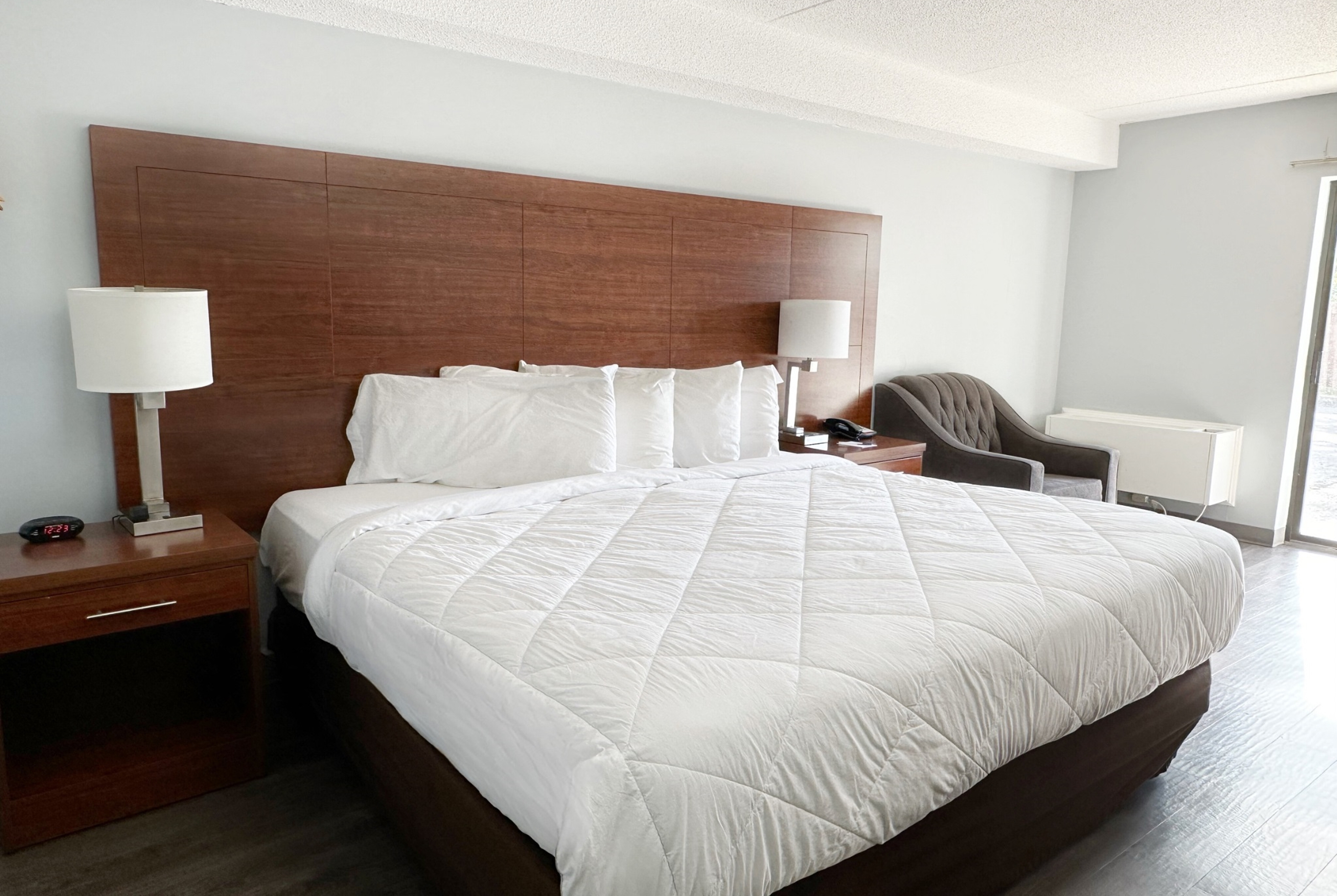 Guest room at the Travelodge by Wyndham Welland in Welland, Ontario