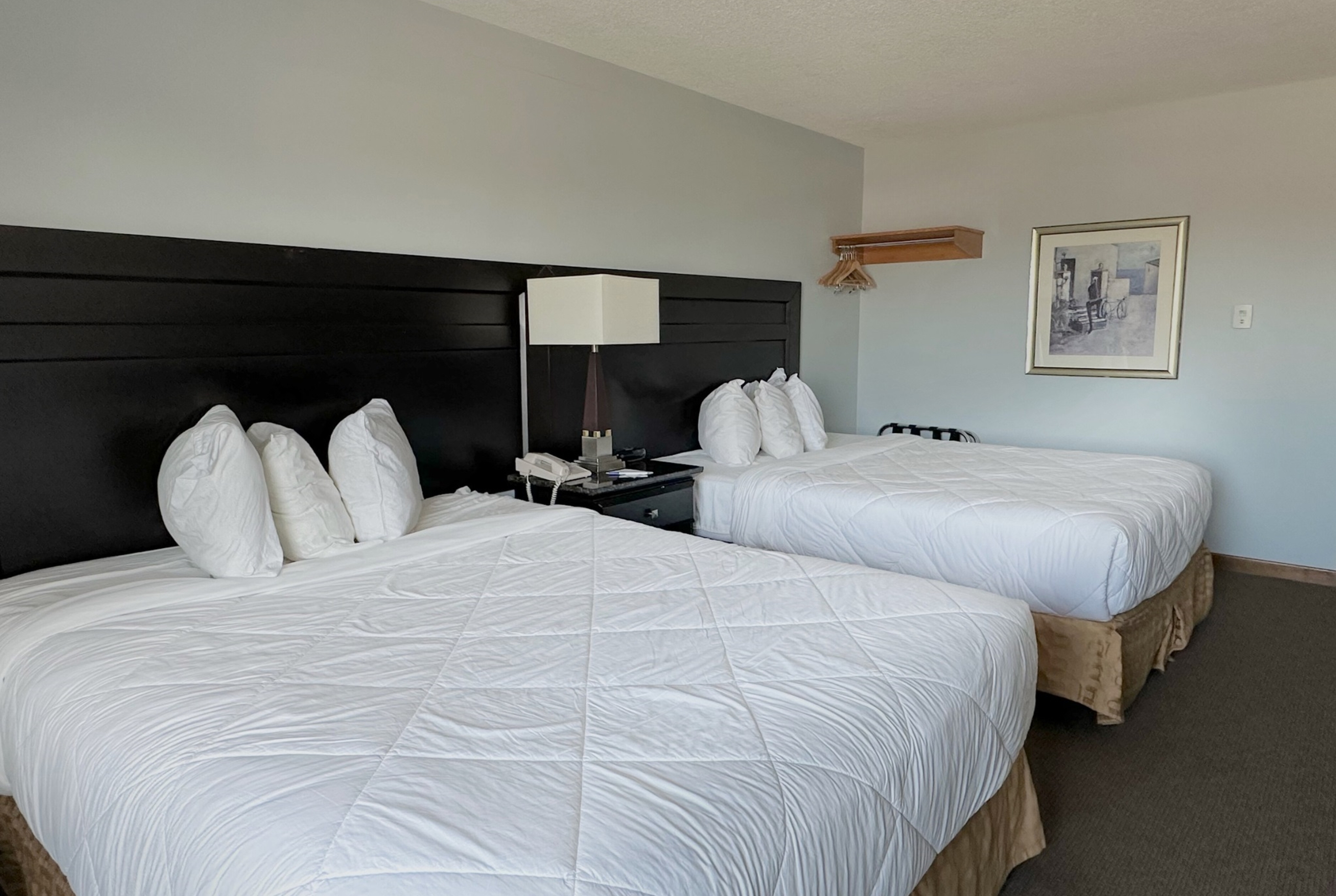 Guest room at the Travelodge by Wyndham Welland in Welland, Ontario