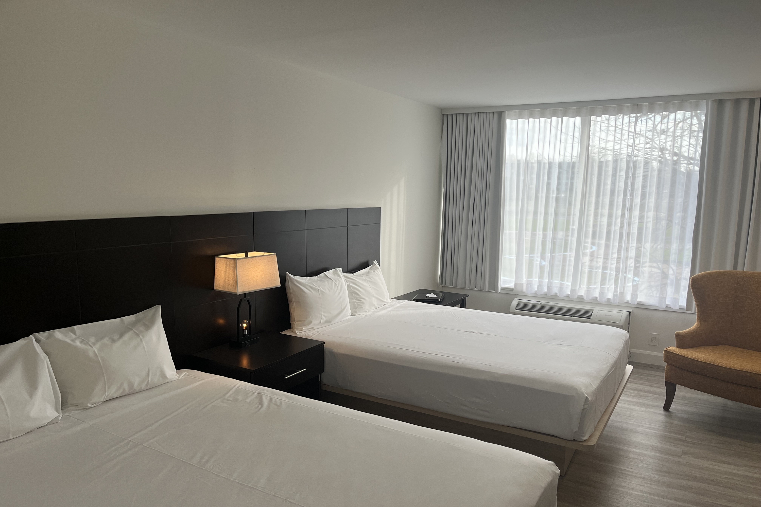 Guest room at the Travelodge by Wyndham Hotel & Convention Centre Quebec City in Quebec City, Quebec