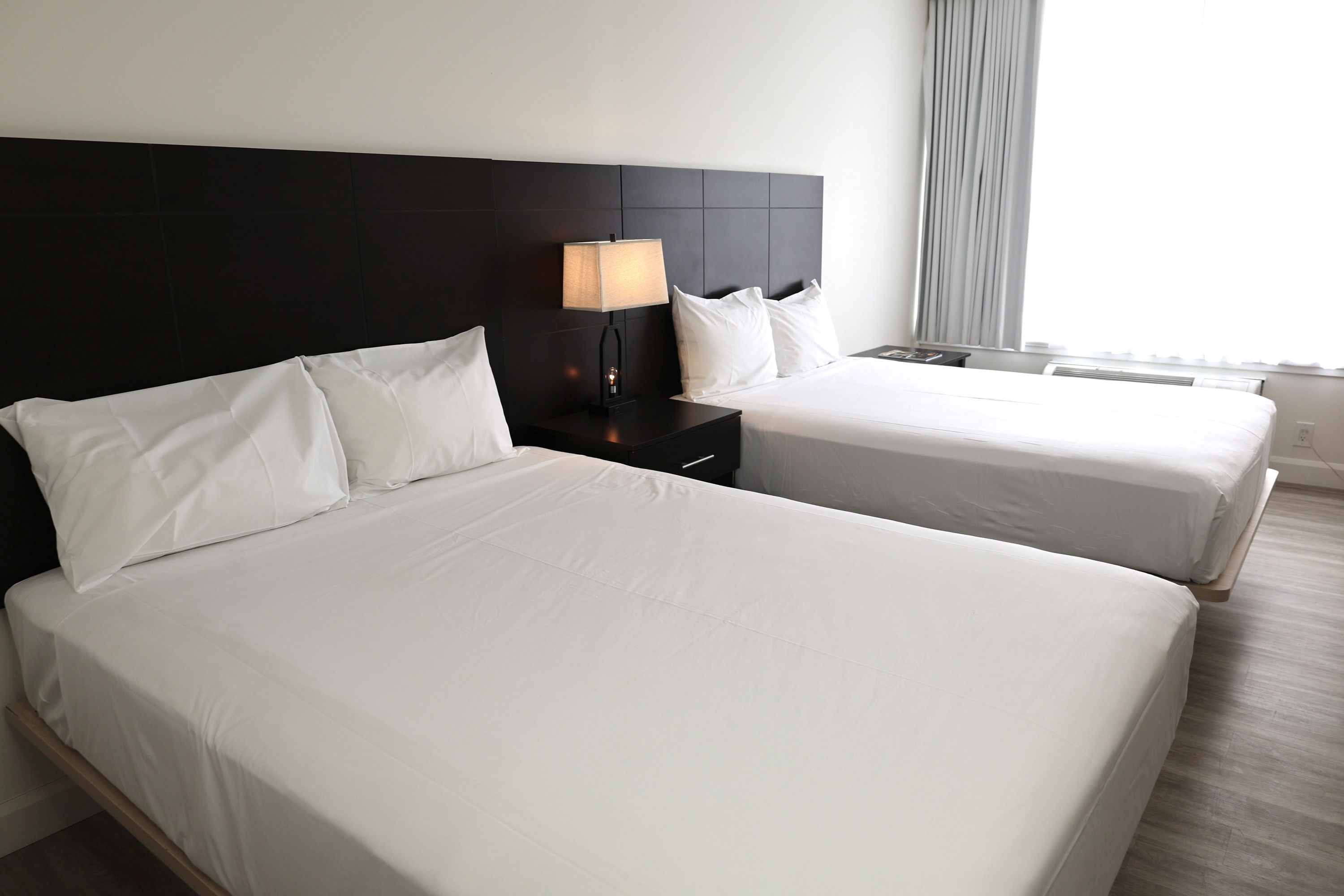 Guest room at the Travelodge by Wyndham Hotel & Convention Centre Quebec City in Quebec City, Quebec