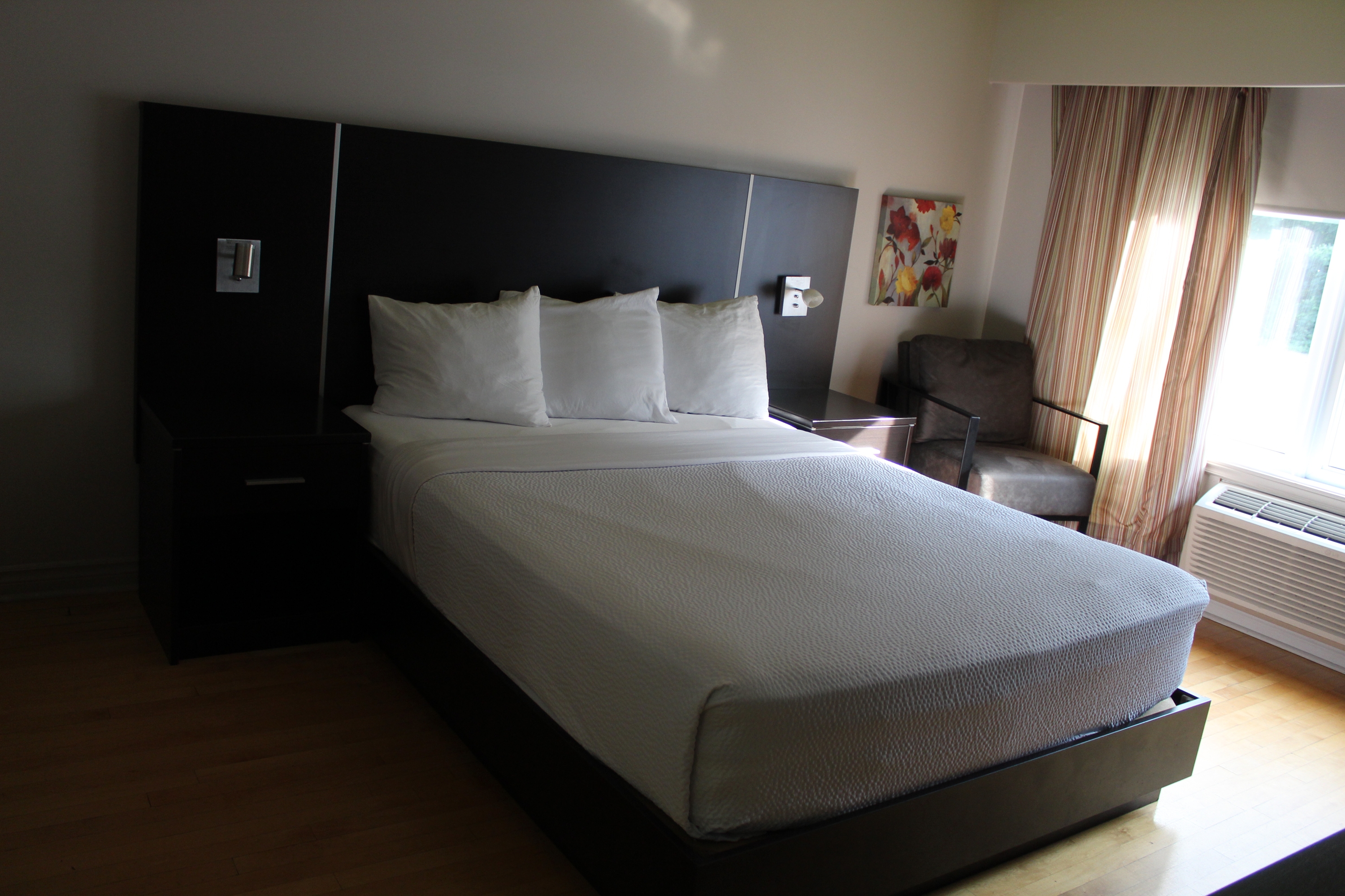 Guest room at the Travelodge by Wyndham Trois-Rivieres in Trois Rivieres, Quebec