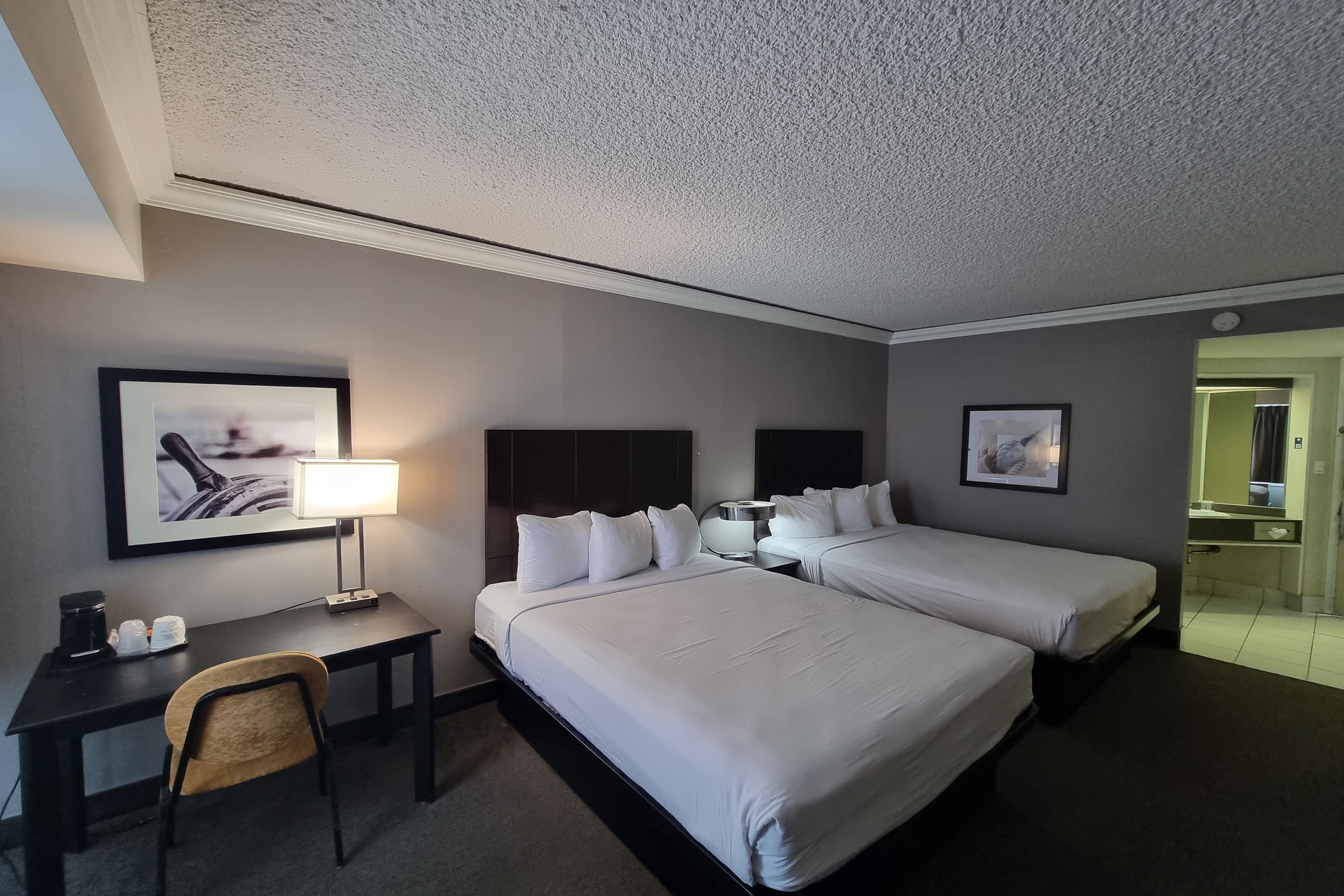 Guest room at the Travelodge by Wyndham Trois-Rivieres in Trois Rivieres, Quebec