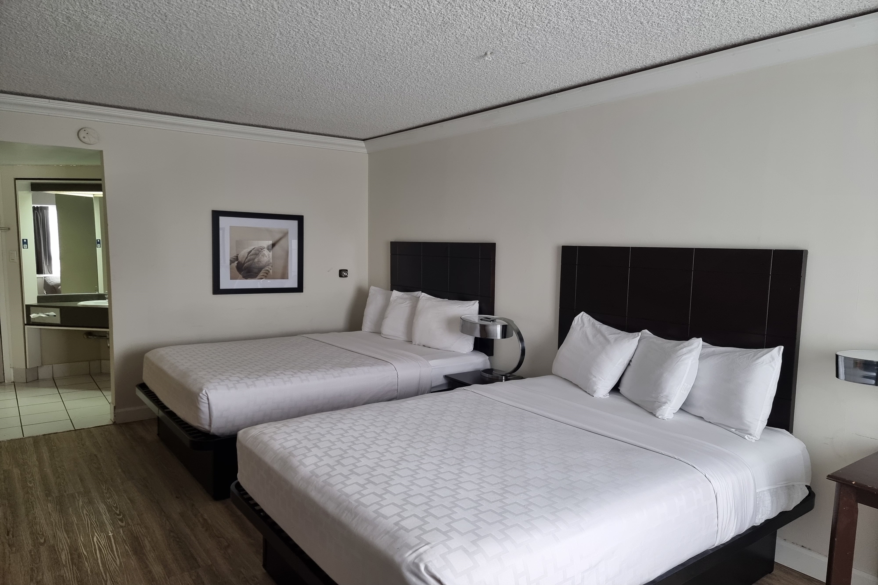Guest room at the Travelodge by Wyndham Trois-Rivieres in Trois Rivieres, Quebec