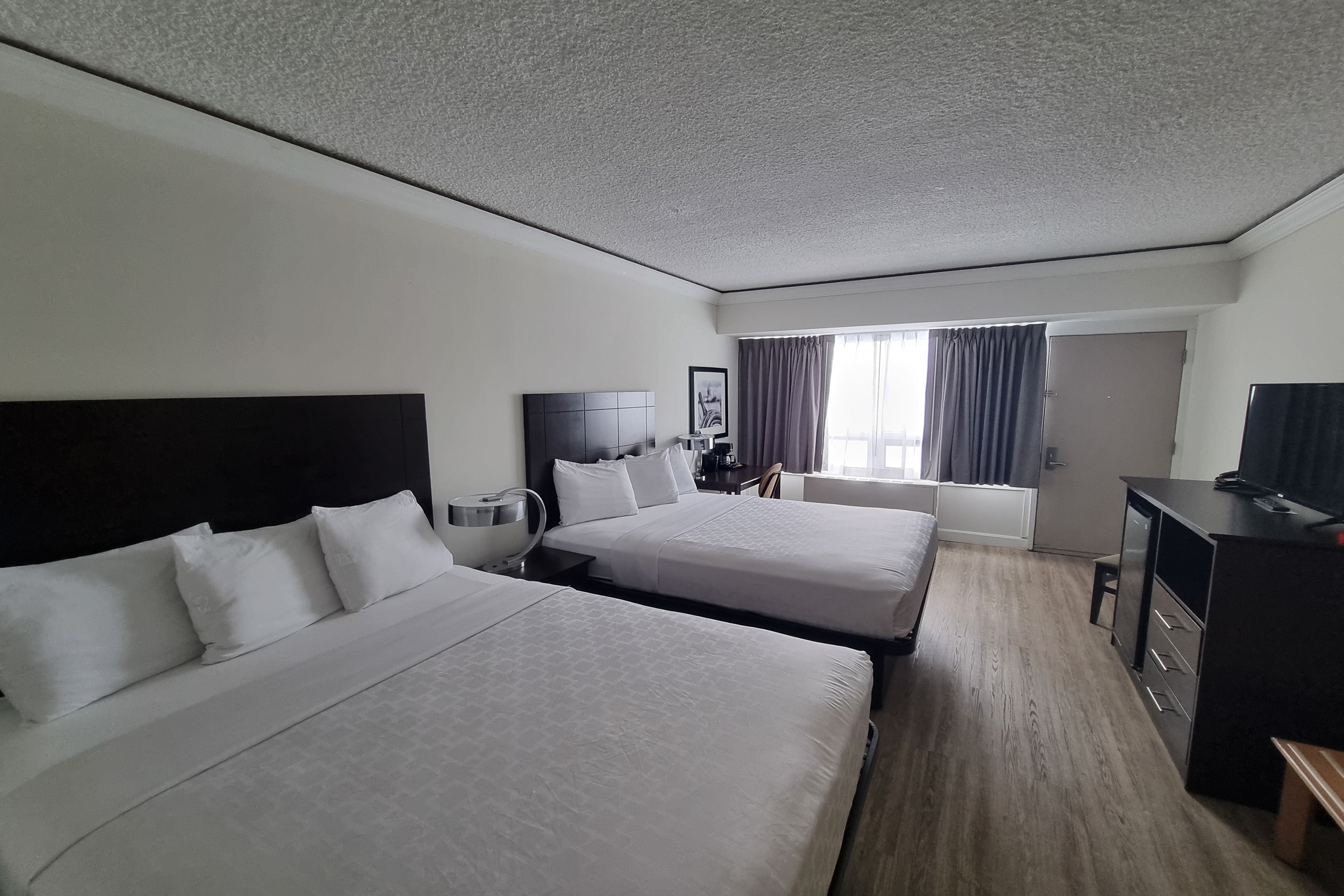 Guest room at the Travelodge by Wyndham Trois-Rivieres in Trois Rivieres, Quebec