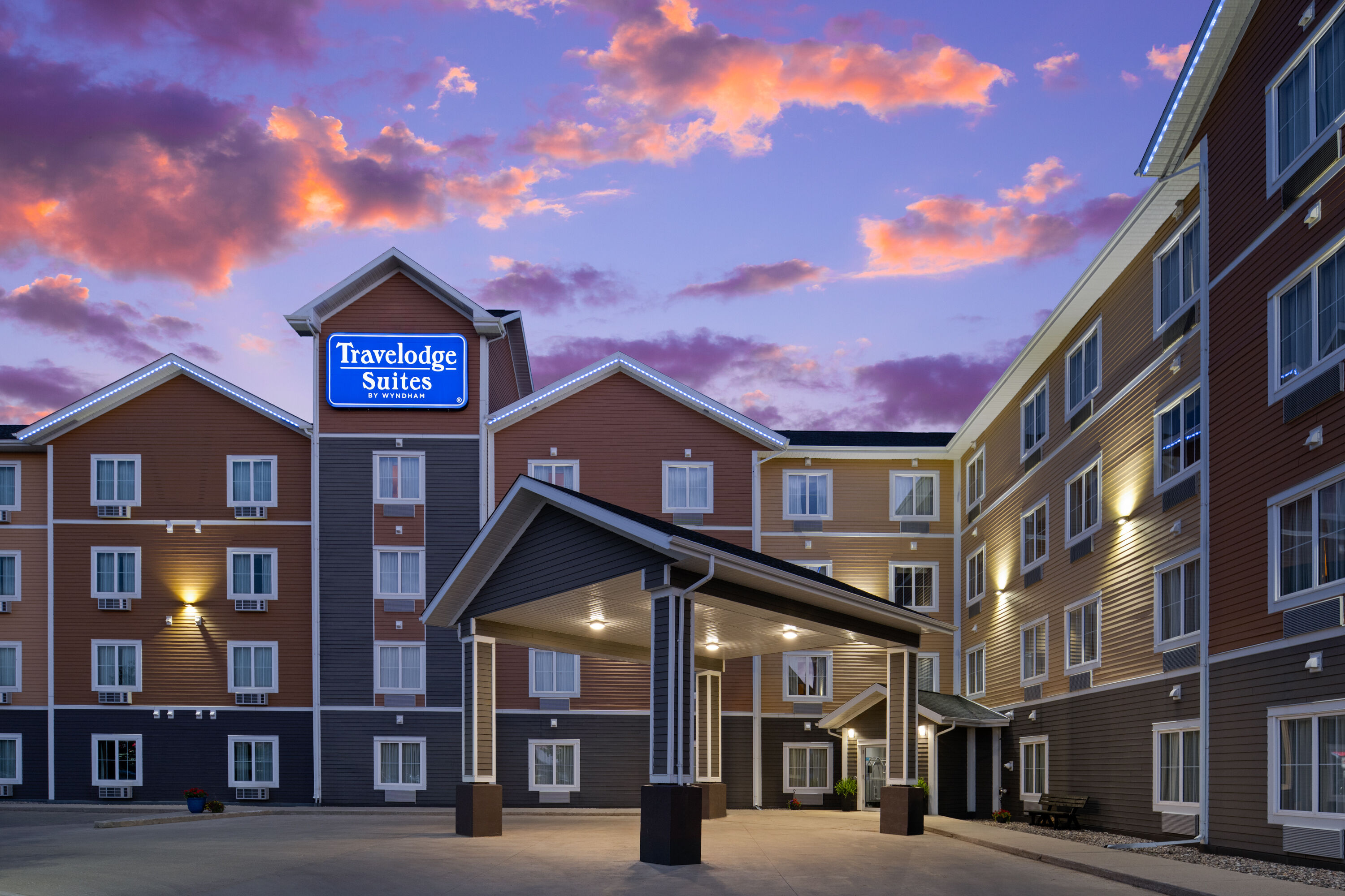 Exterior Dusk Image of Travelodge Suites by Wyndham Estevan hotel in Estevan, Saskatchewan