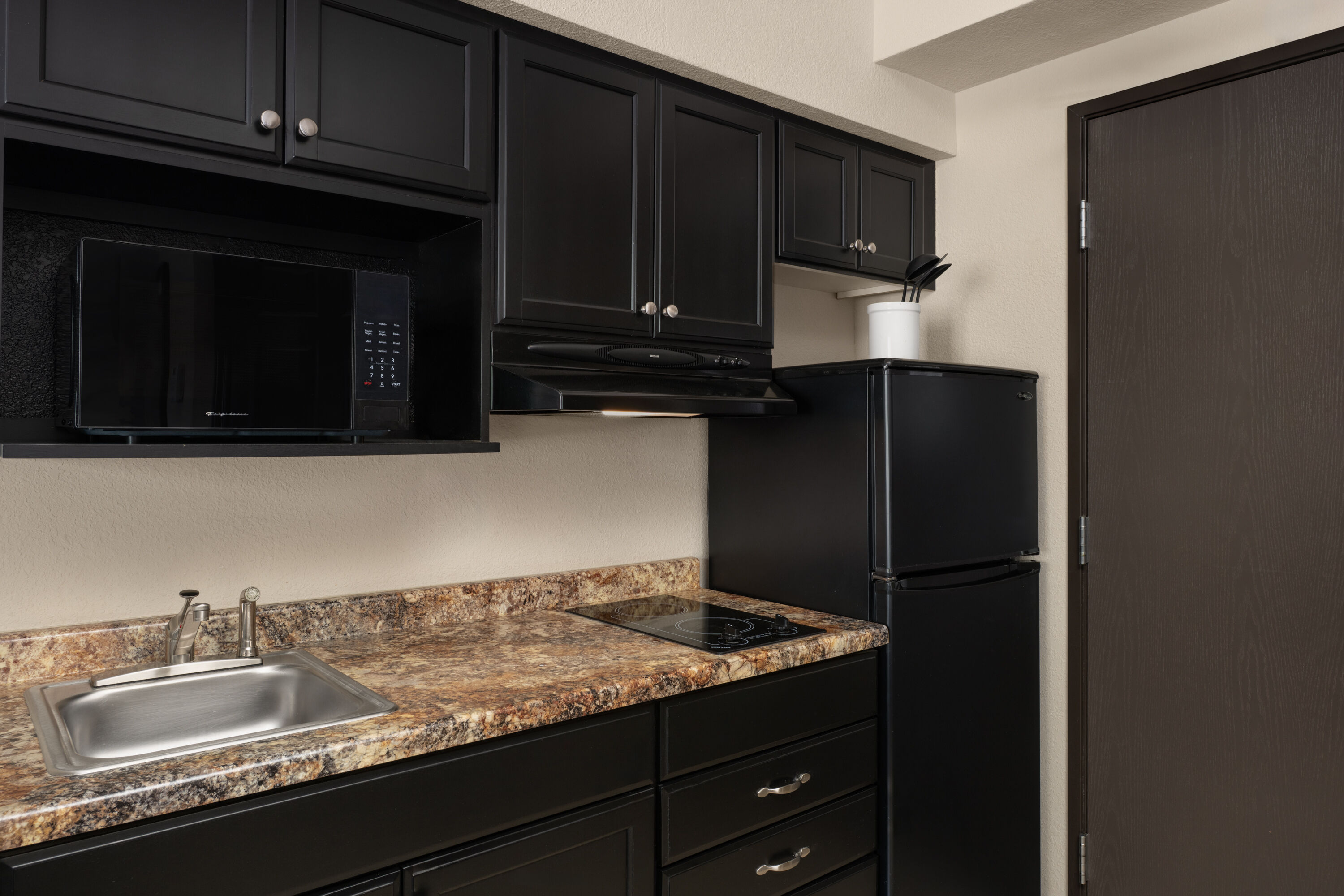 Guest room at the Travelodge Suites by Wyndham Estevan in Estevan, Saskatchewan