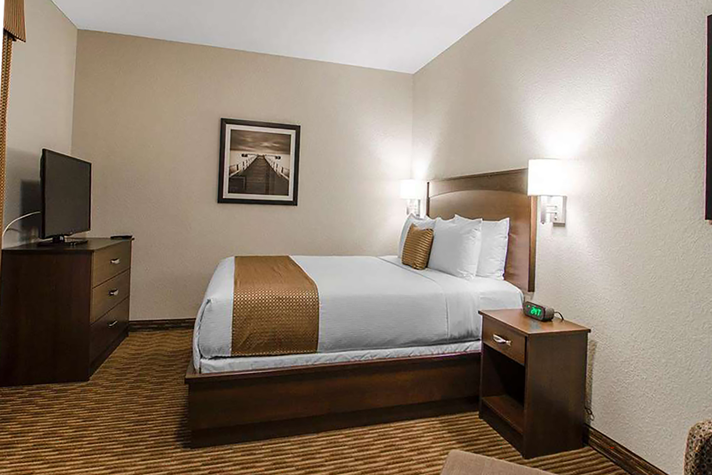 Guest room at the Travelodge Suites by Wyndham Estevan in Estevan, Saskatchewan