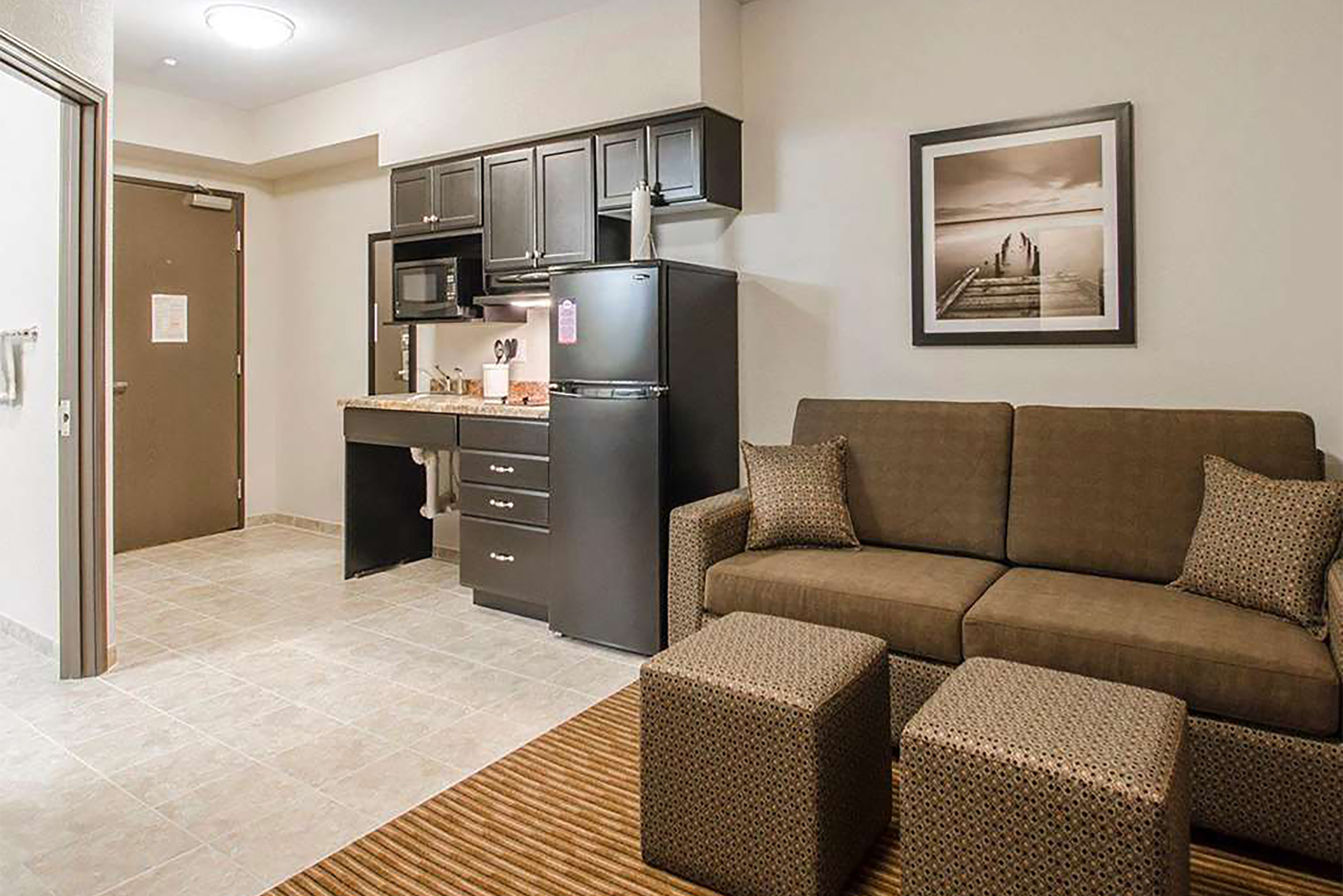 Guest room at the Travelodge Suites by Wyndham Estevan in Estevan, Saskatchewan