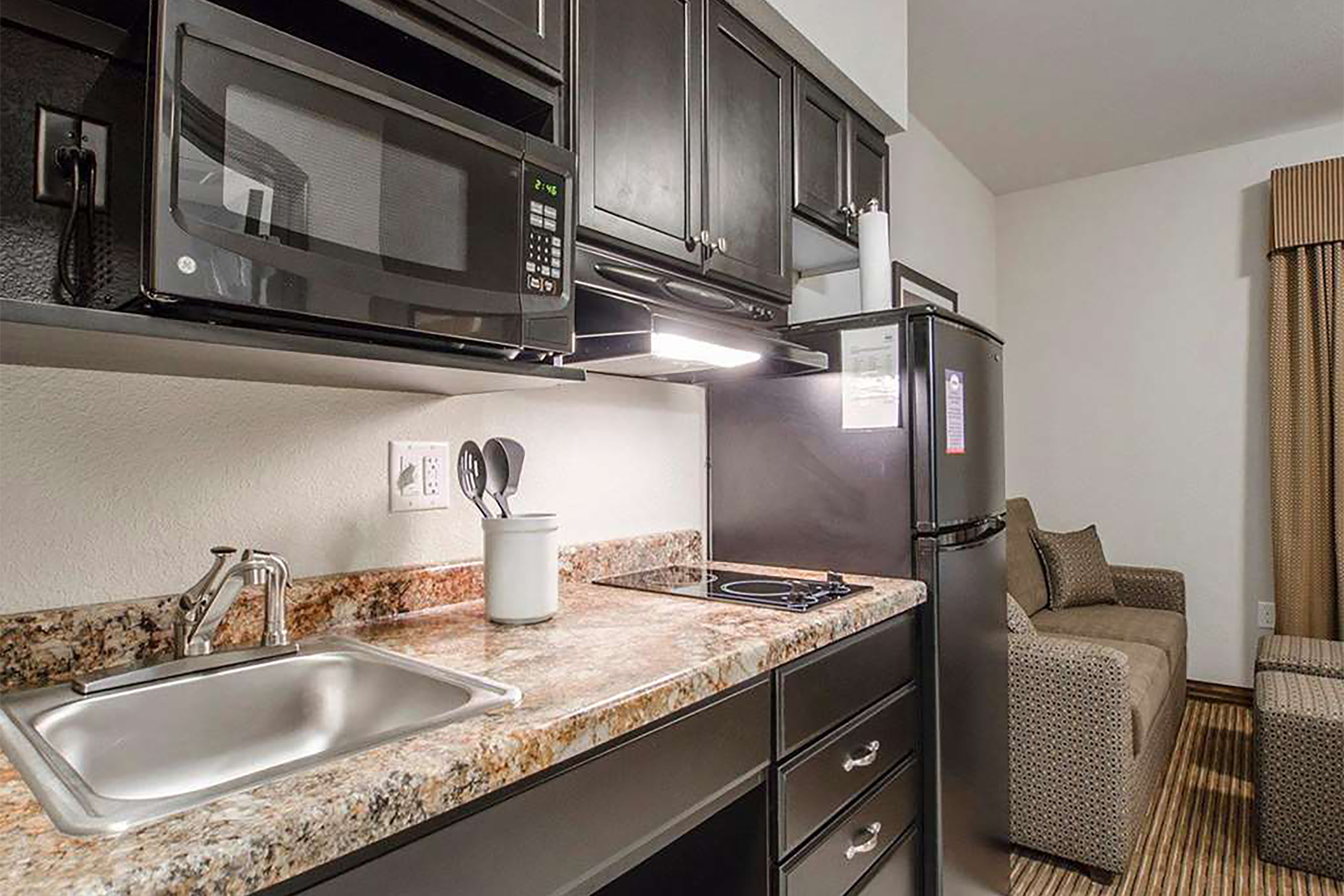 Guest room at the Travelodge Suites by Wyndham Estevan in Estevan, Saskatchewan