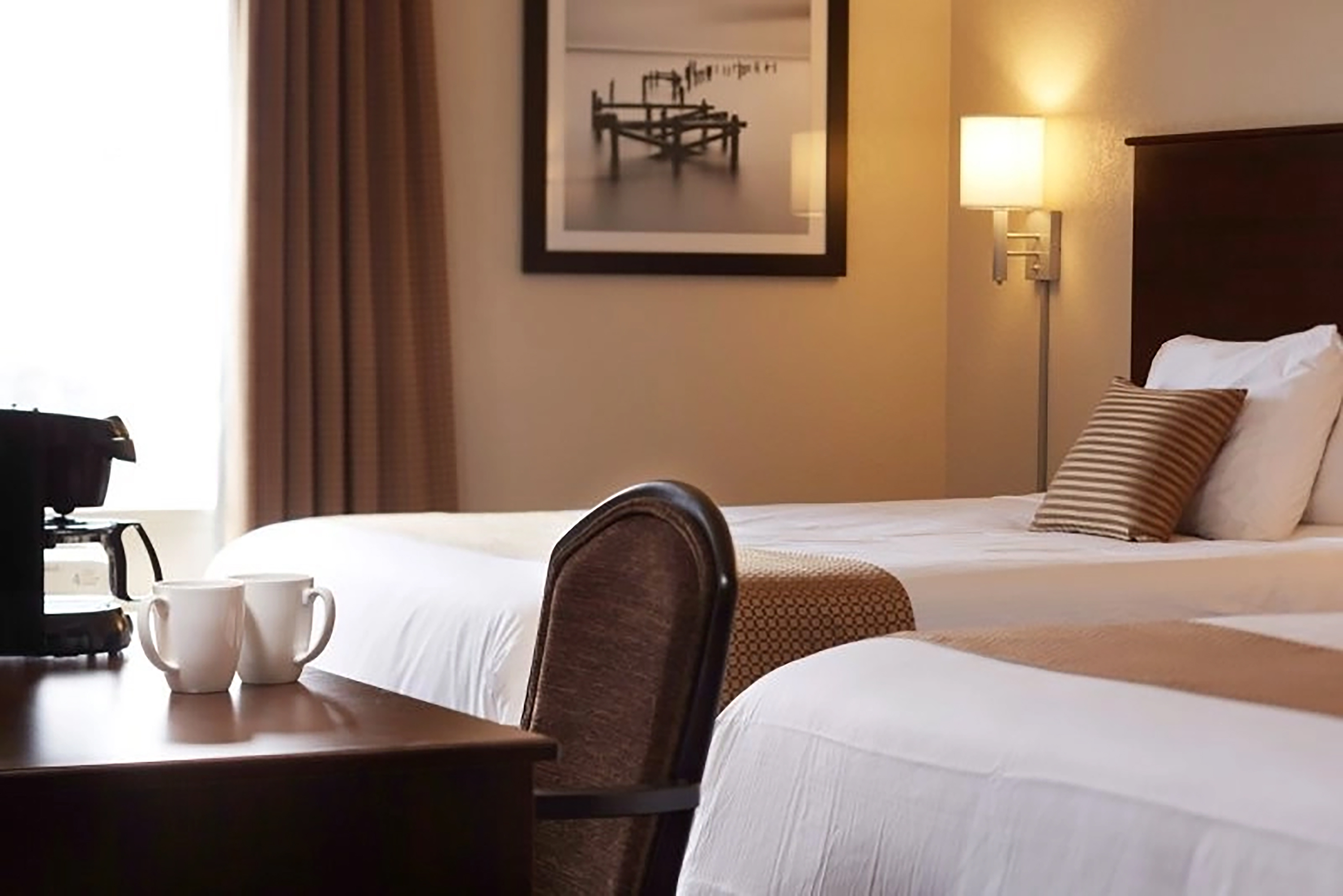 Guest room at the Travelodge Suites by Wyndham Estevan in Estevan, Saskatchewan