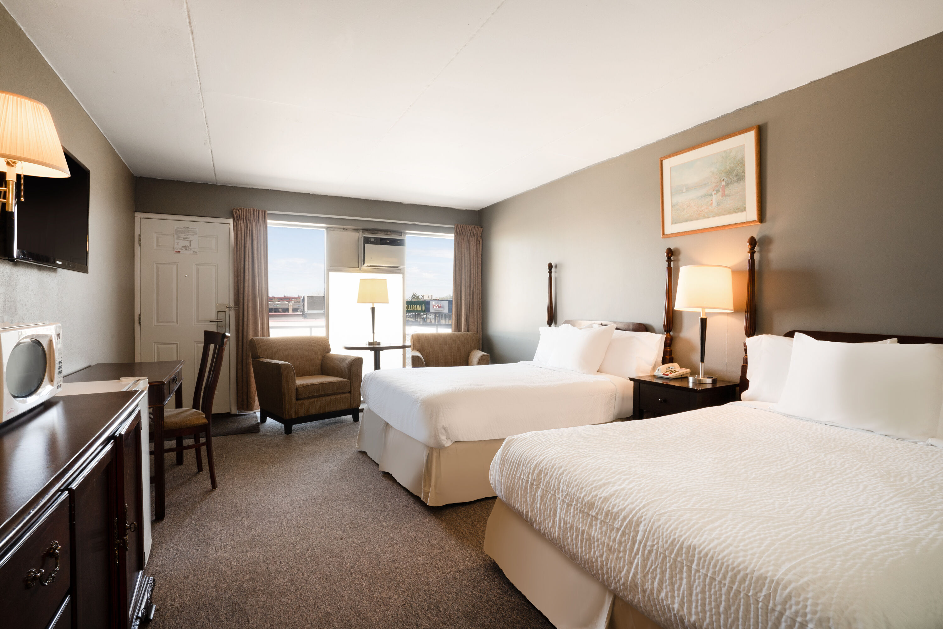 Guest room at the Thriftlodge by Wyndham Regina North in Regina, Saskatchewan