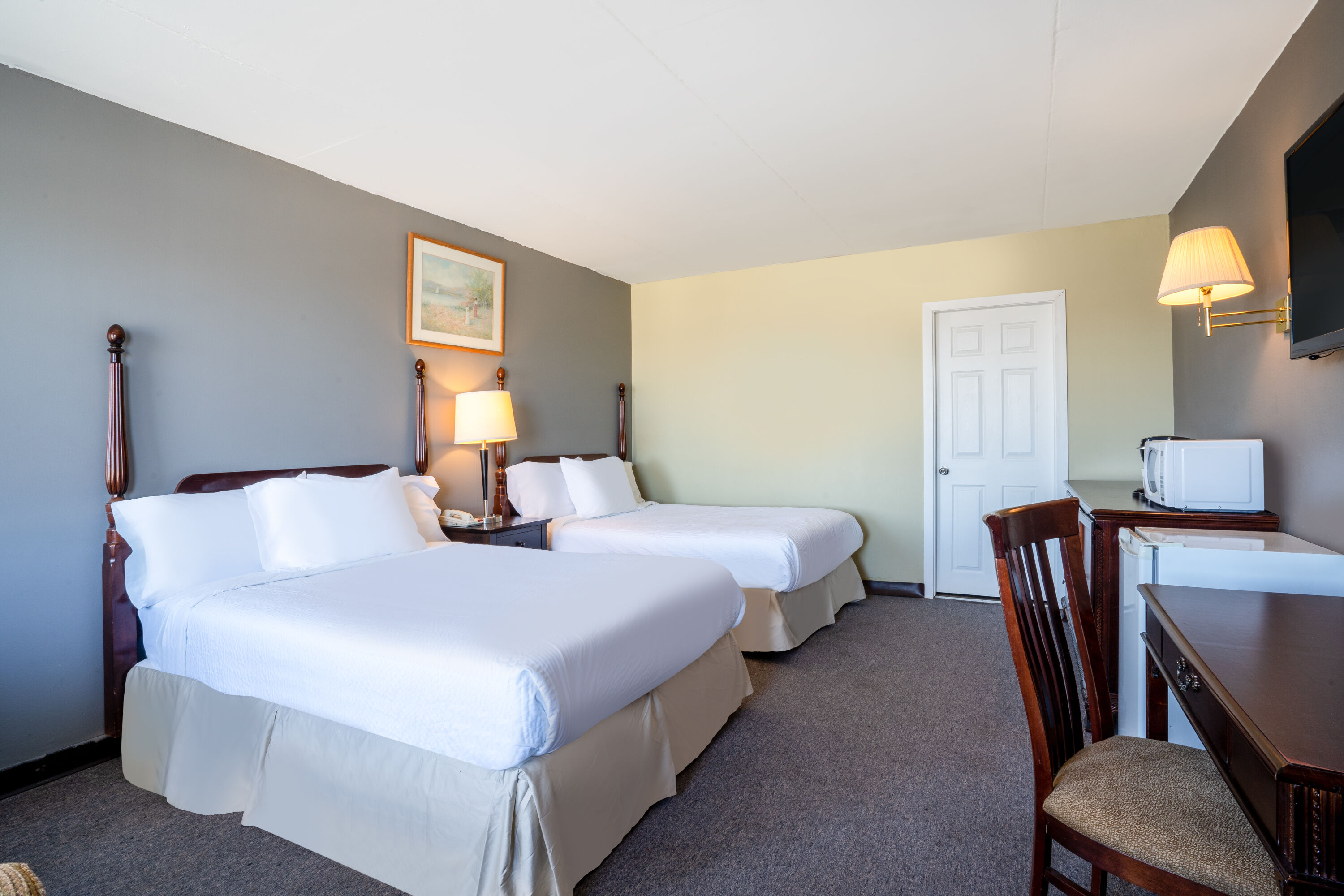 Guest room at the Thriftlodge by Wyndham Regina North in Regina, Saskatchewan