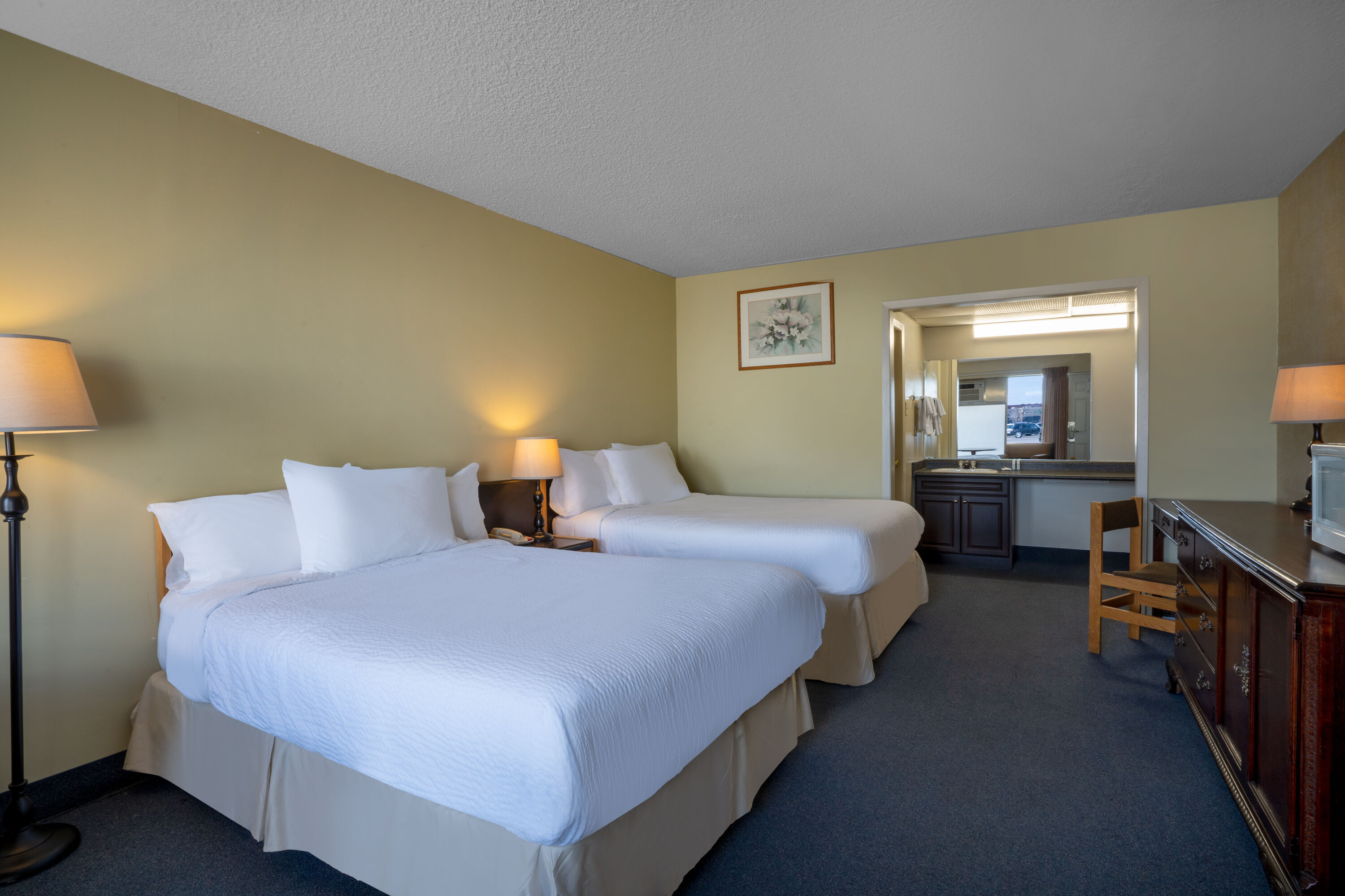 Guest room at the Thriftlodge by Wyndham Regina North in Regina, Saskatchewan