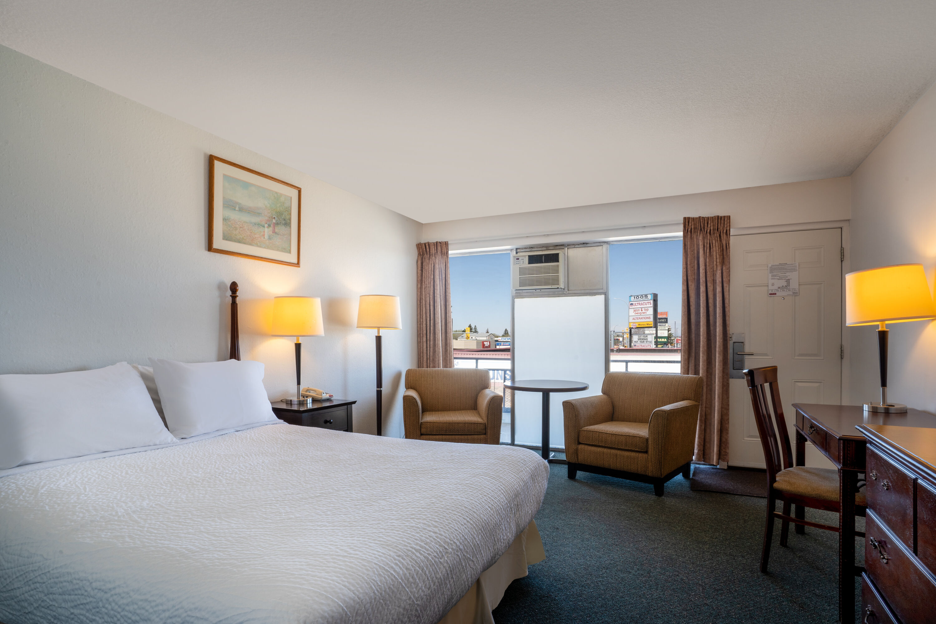 Guest room at the Thriftlodge by Wyndham Regina North in Regina, Saskatchewan