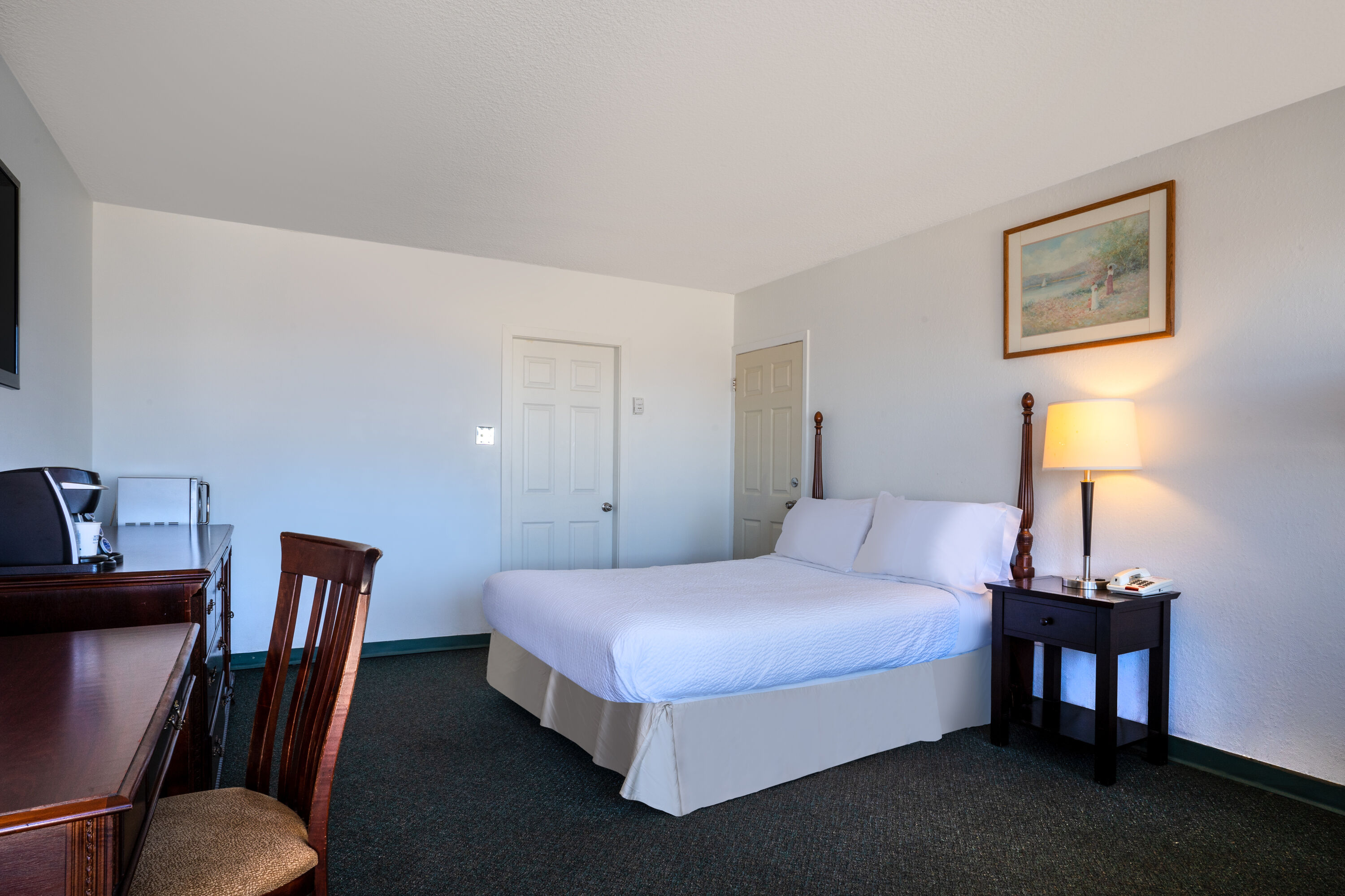 Guest room at the Thriftlodge by Wyndham Regina North in Regina, Saskatchewan