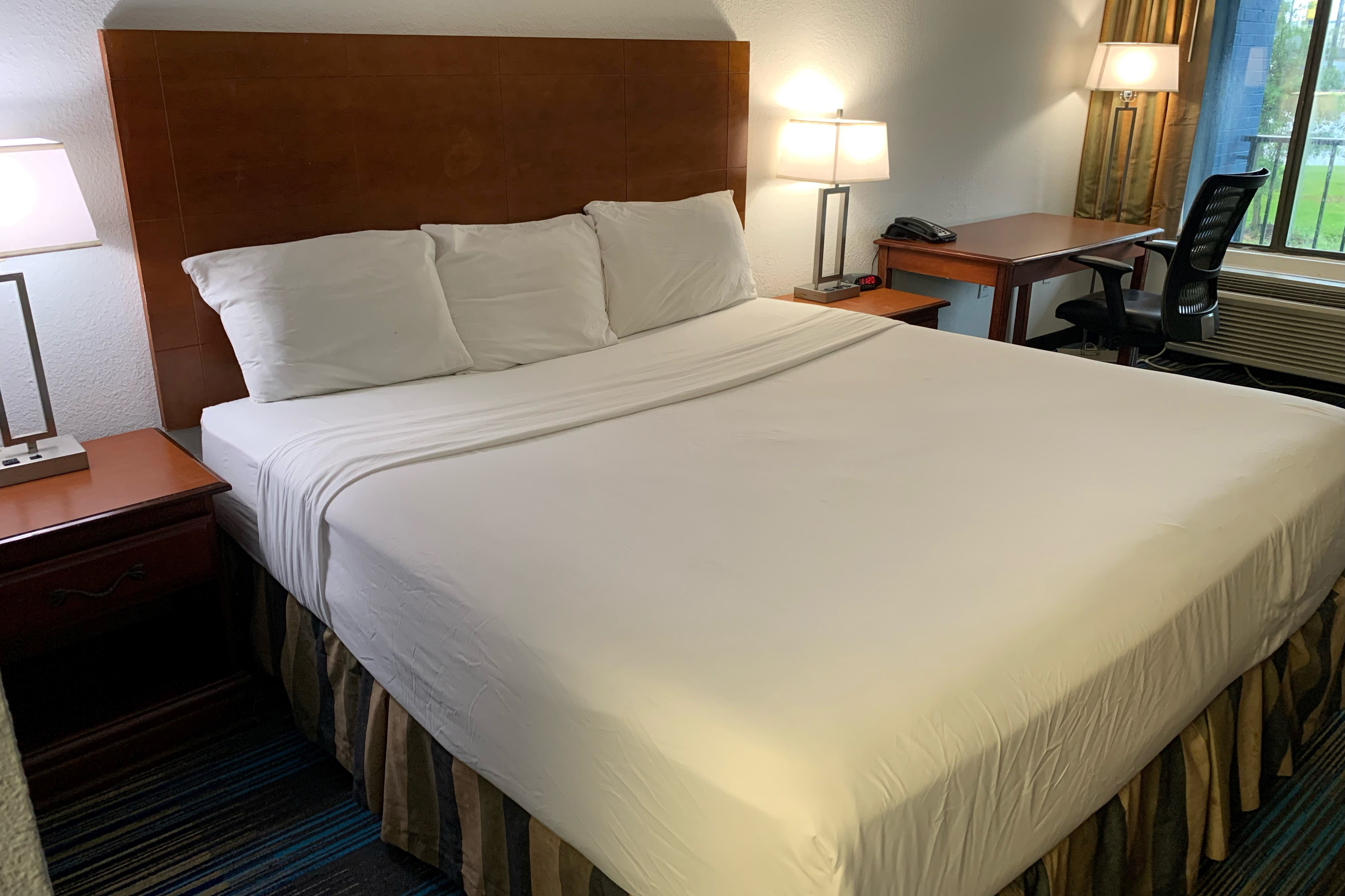 Guest room at the Travelodge by Wyndham Mobile AL in Mobile, Alabama