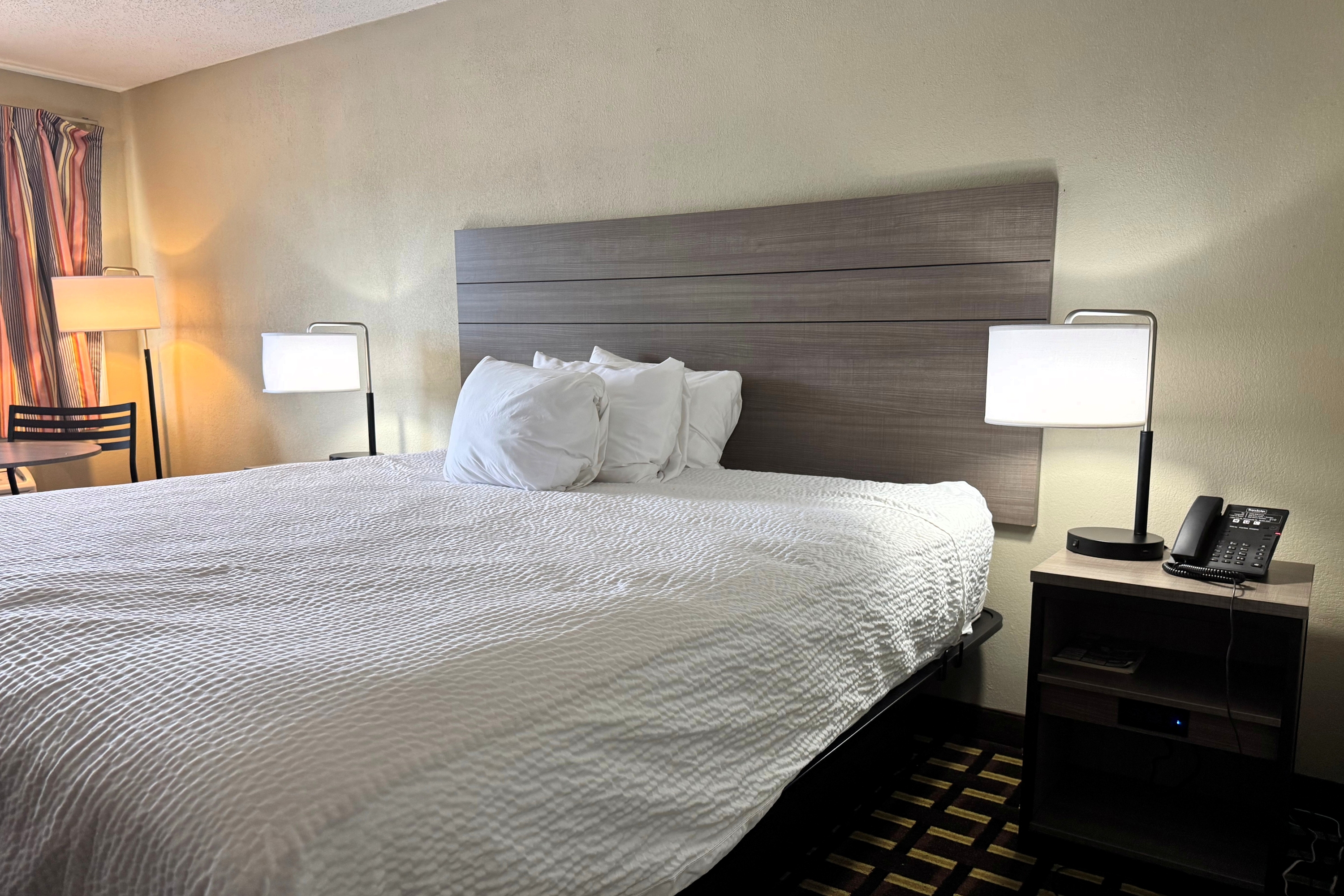 Guest room at the Travelodge by Wyndham Thomasville AL in Thomasville, Alabama