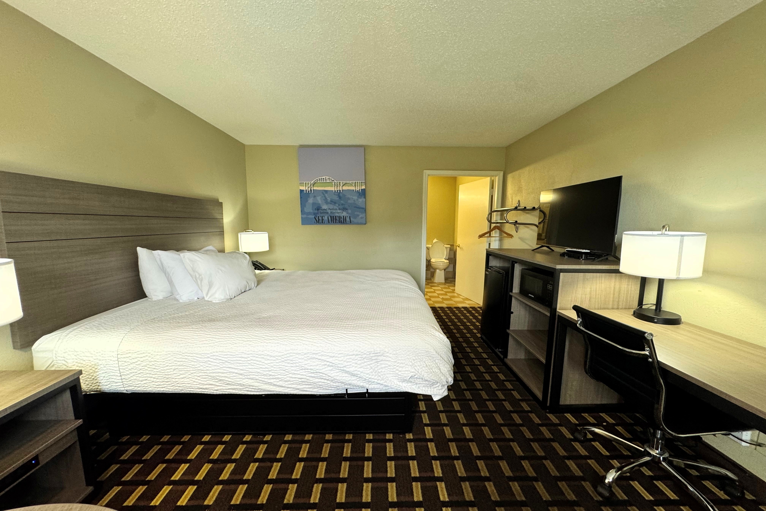 Guest room at the Travelodge by Wyndham Thomasville AL in Thomasville, Alabama