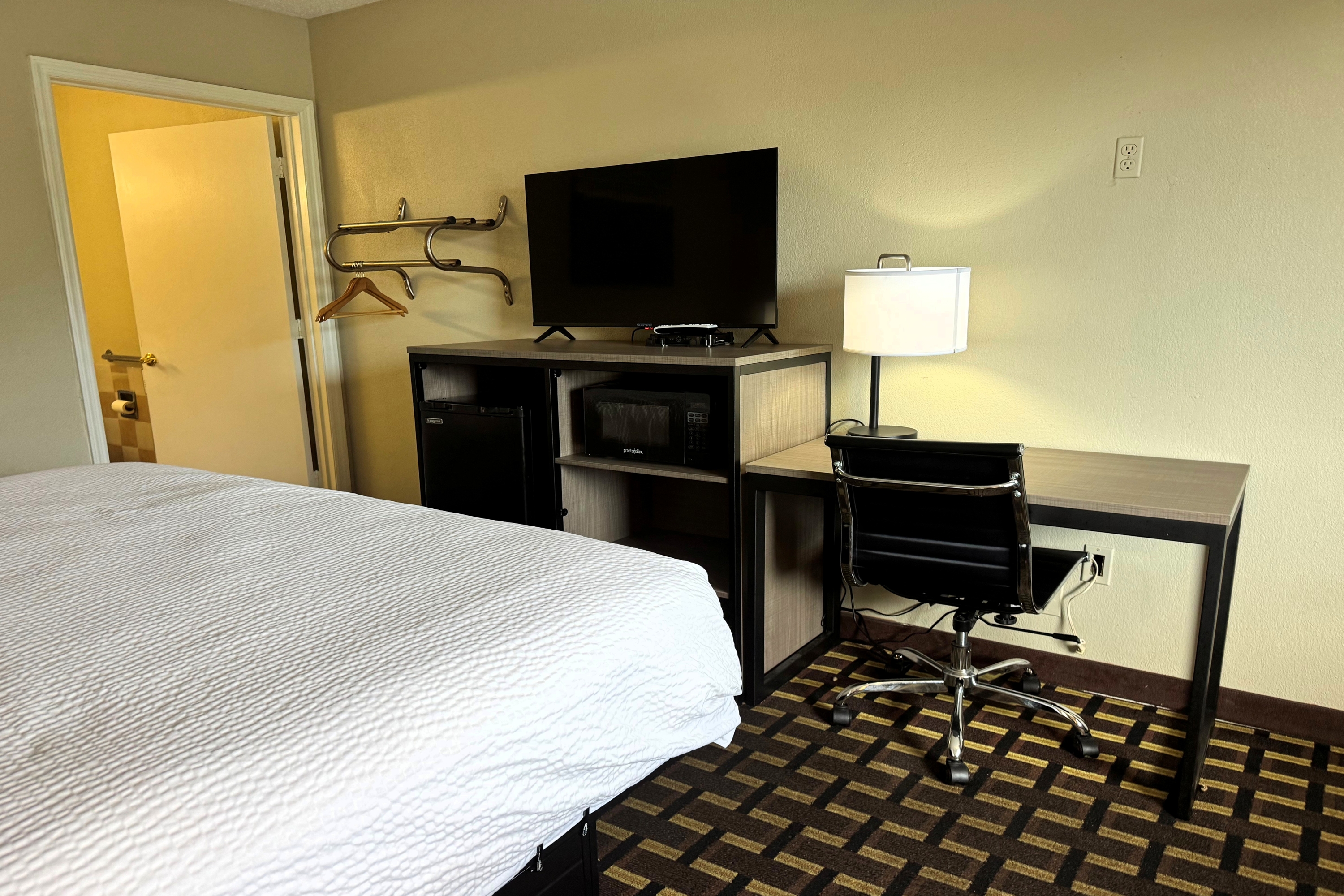 Guest room at the Travelodge by Wyndham Thomasville AL in Thomasville, Alabama