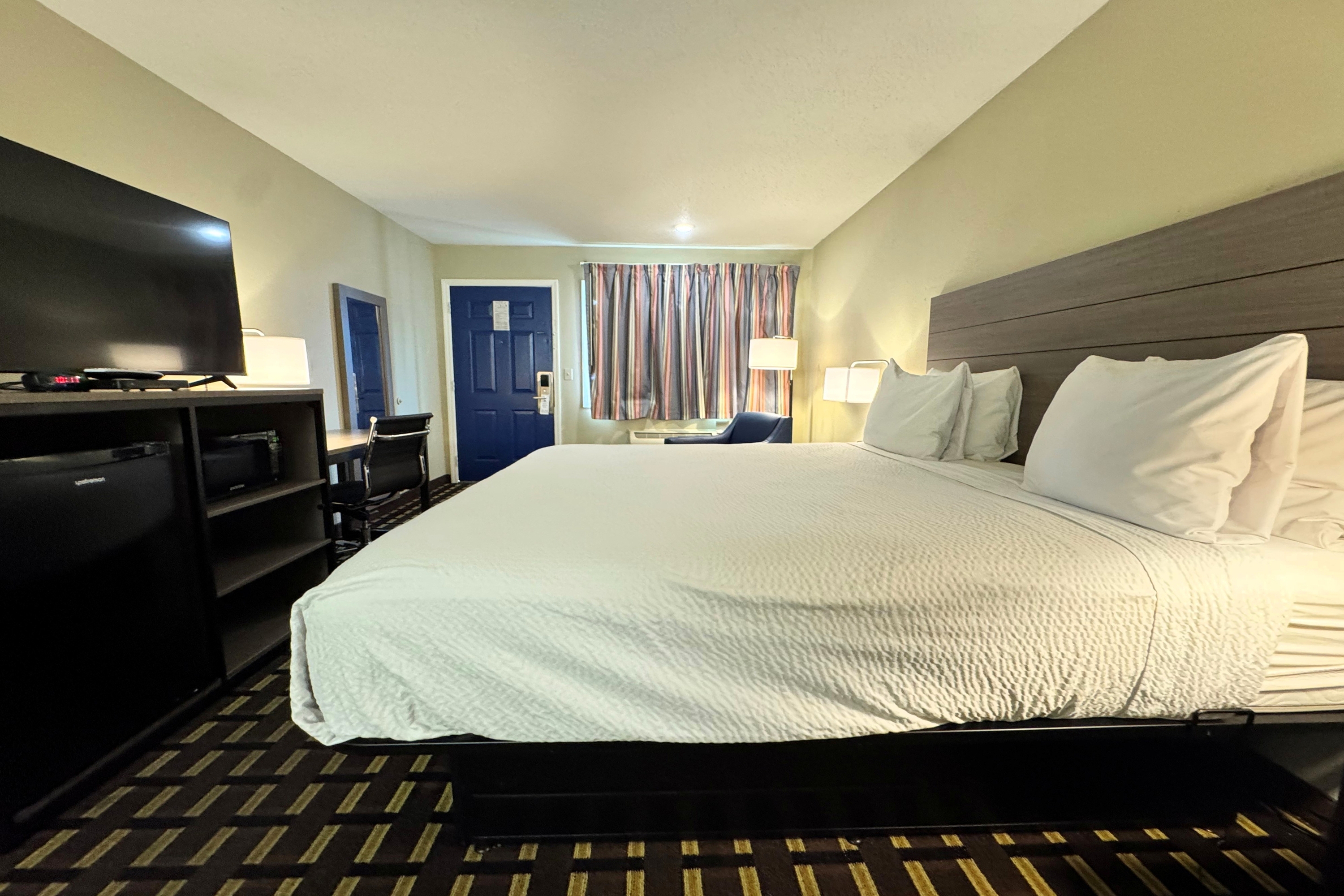 Guest room at the Travelodge by Wyndham Thomasville AL in Thomasville, Alabama