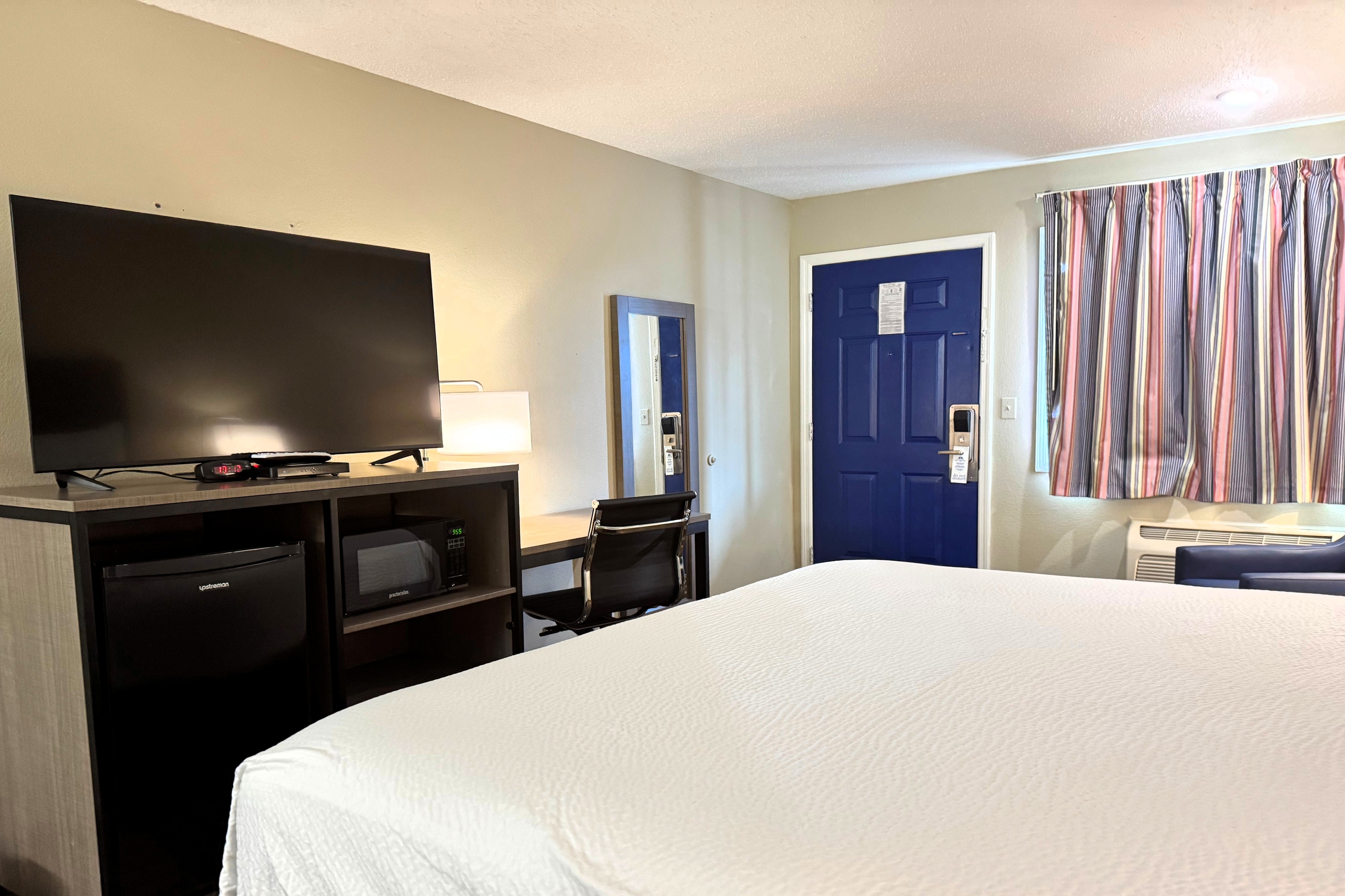 Guest room at the Travelodge by Wyndham Thomasville AL in Thomasville, Alabama